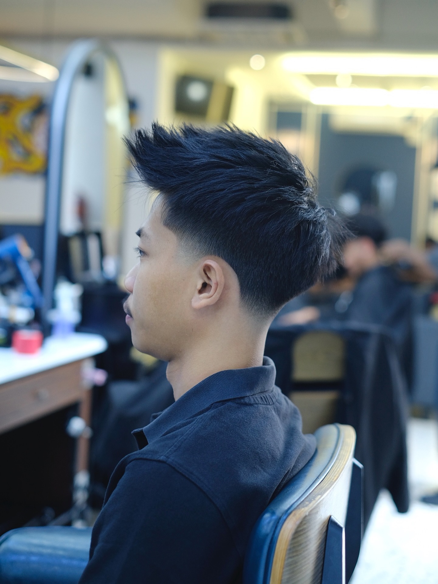 Sleek Voluminous Quiff with Angular Detail