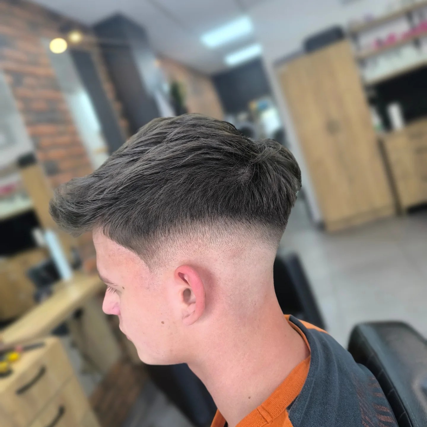 Slick Swept-Back Quiff with Tapered Nape