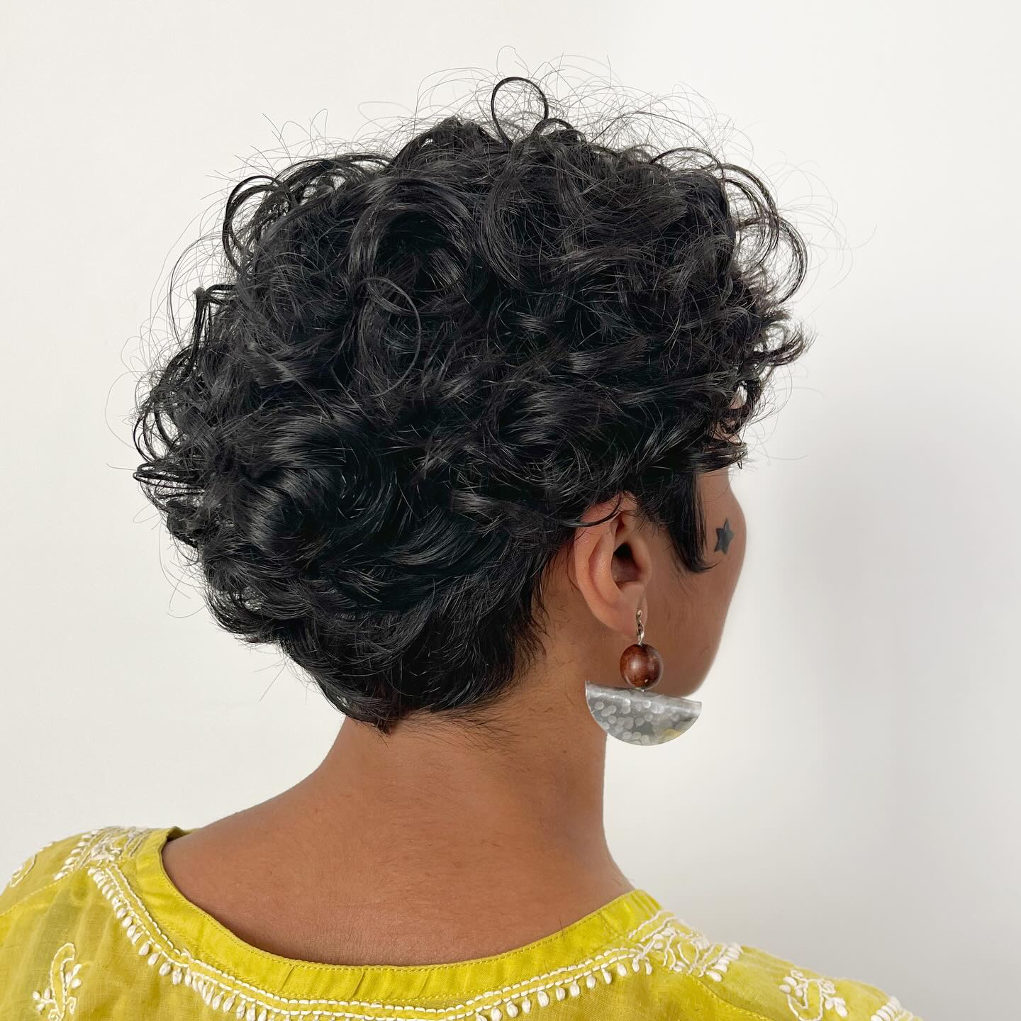 Stylish Textured Curly Pixie Cut with Volume