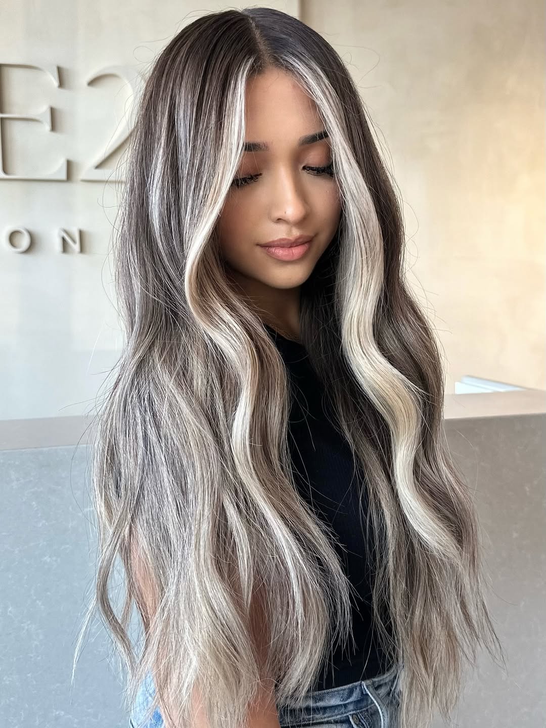 Subtle Silver-Blonde Balayage on Long Waves