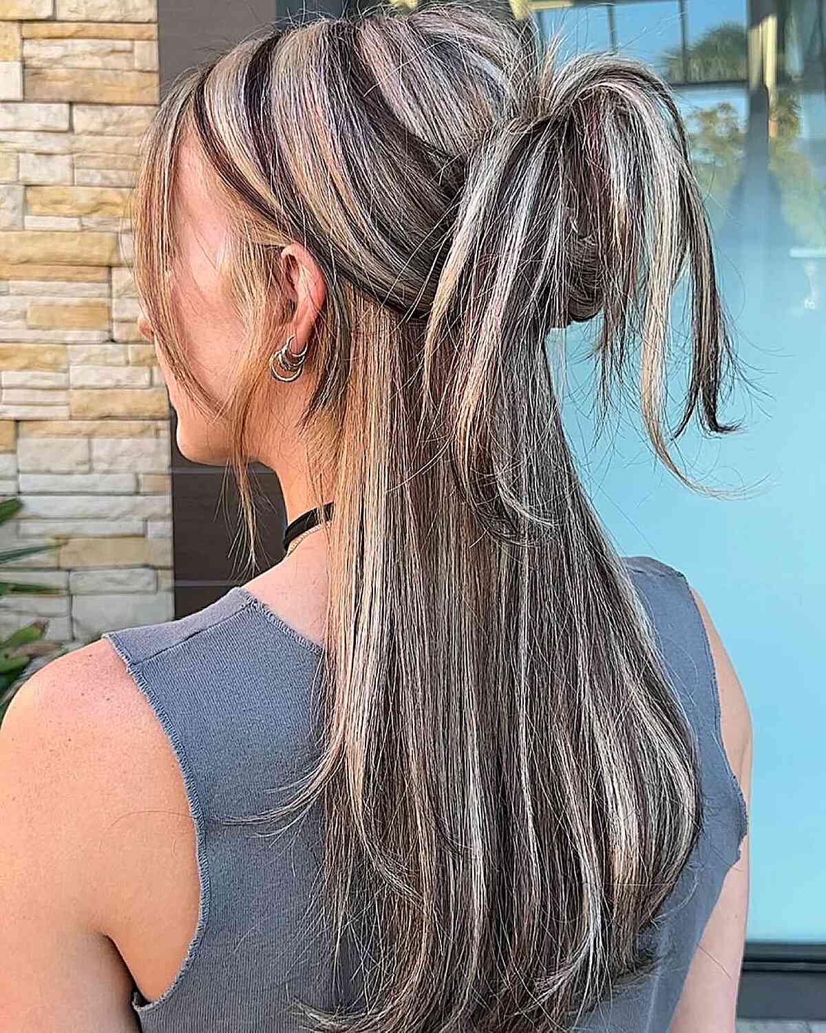 Trendy Y2K Inspired Half-Up Hairstyle with Highlights