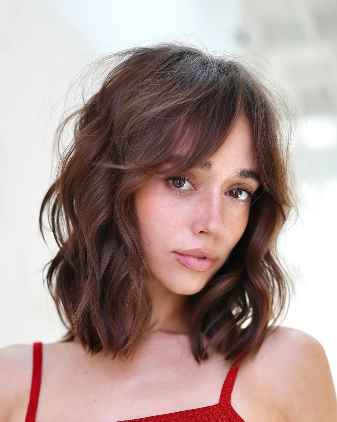 Casual Chestnut Waves with Sweeping Bangs