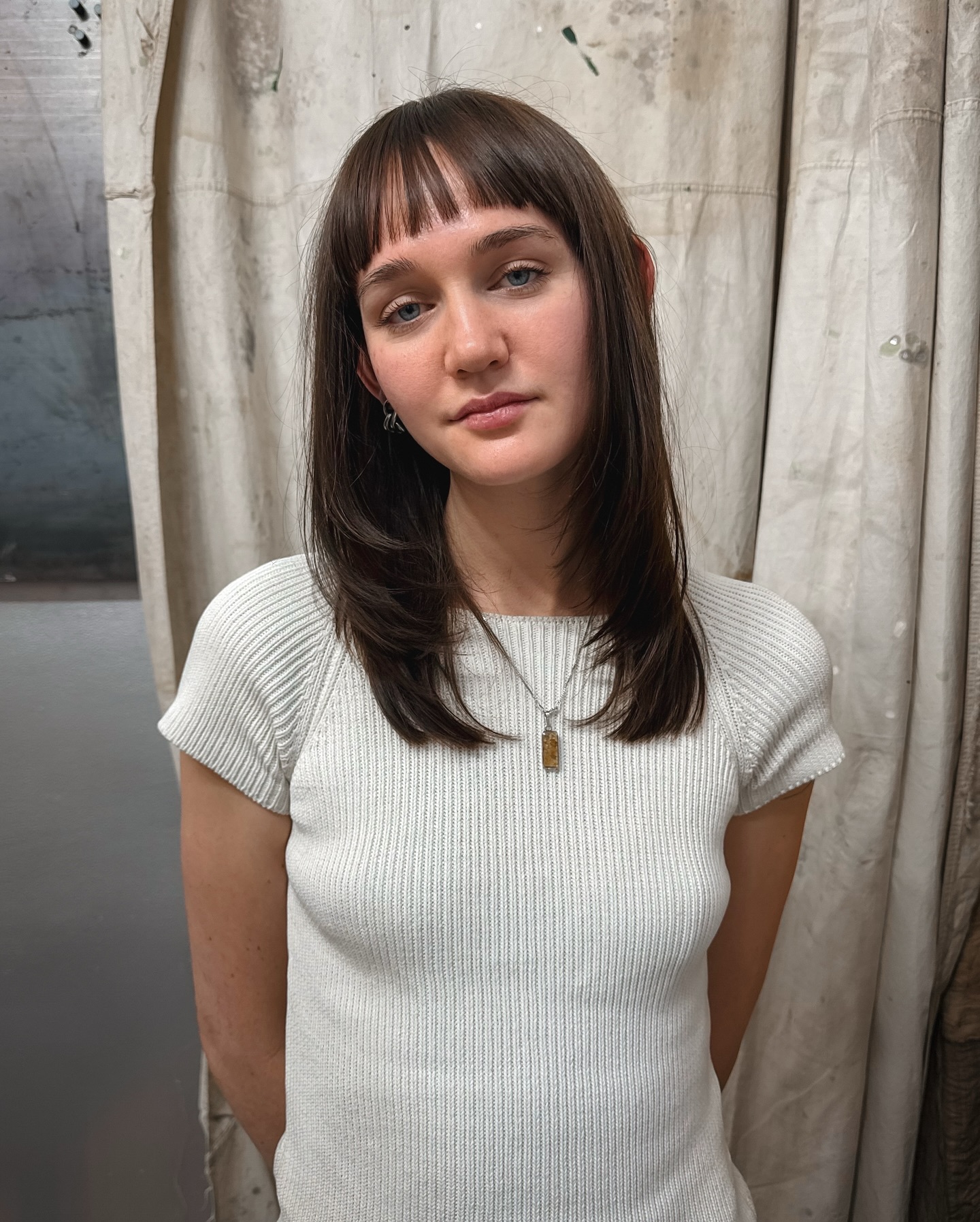 Chic Long Layers with Subtle Blunt Bangs