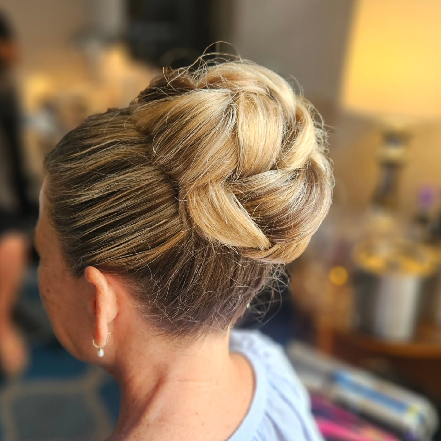 Classic Braided Updo with Voluminous Bun