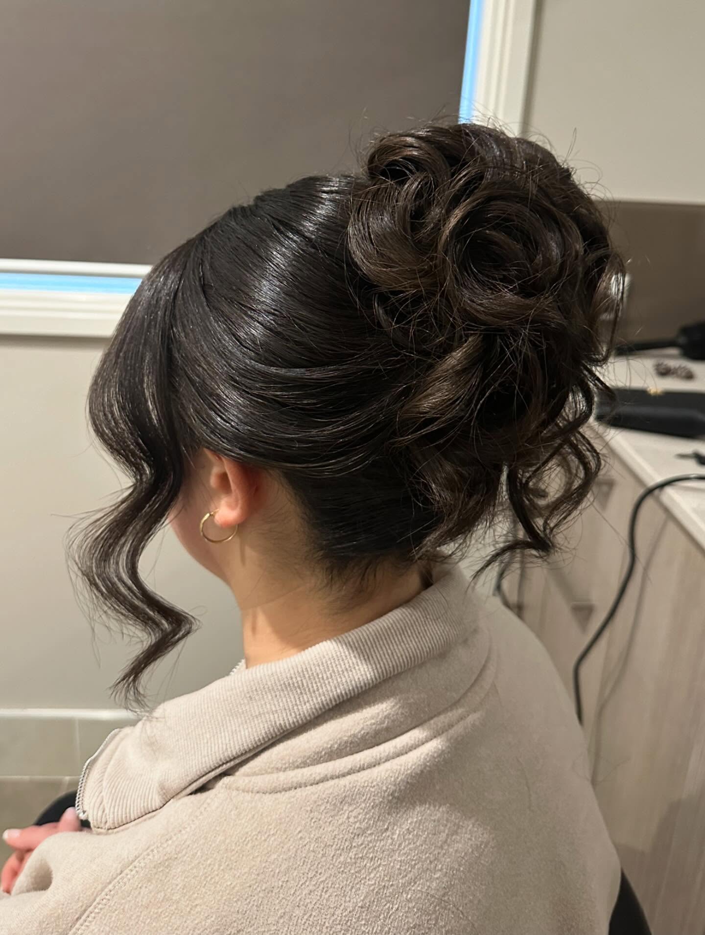Classic Side-Swept Curls Updo