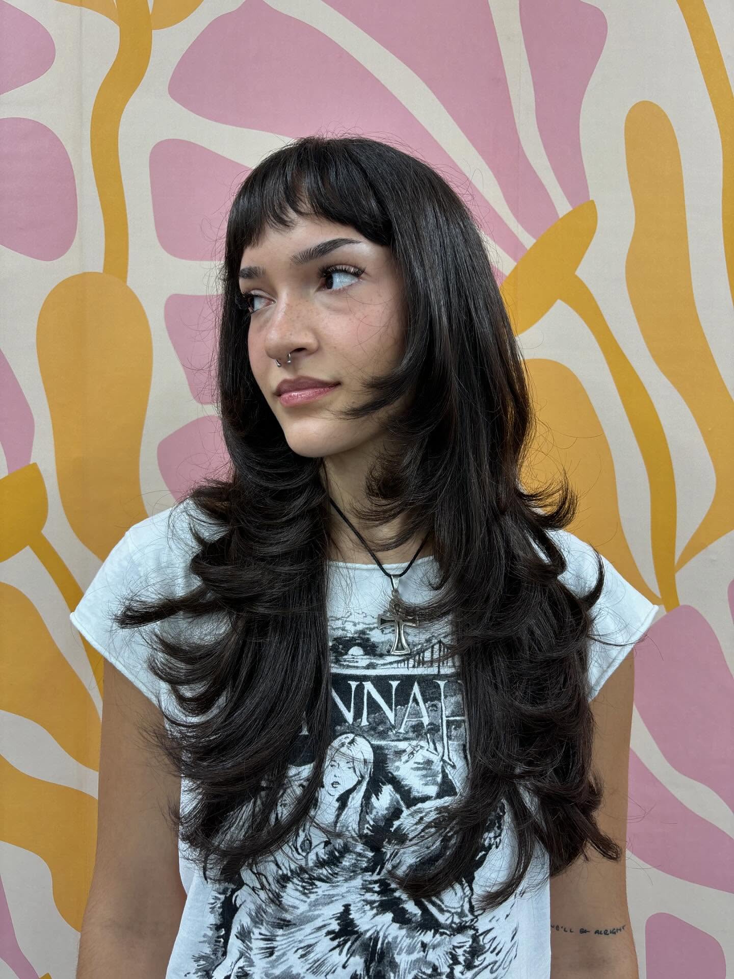 Effortlessly Elegant Long Layers with Soft Fringe Bangs