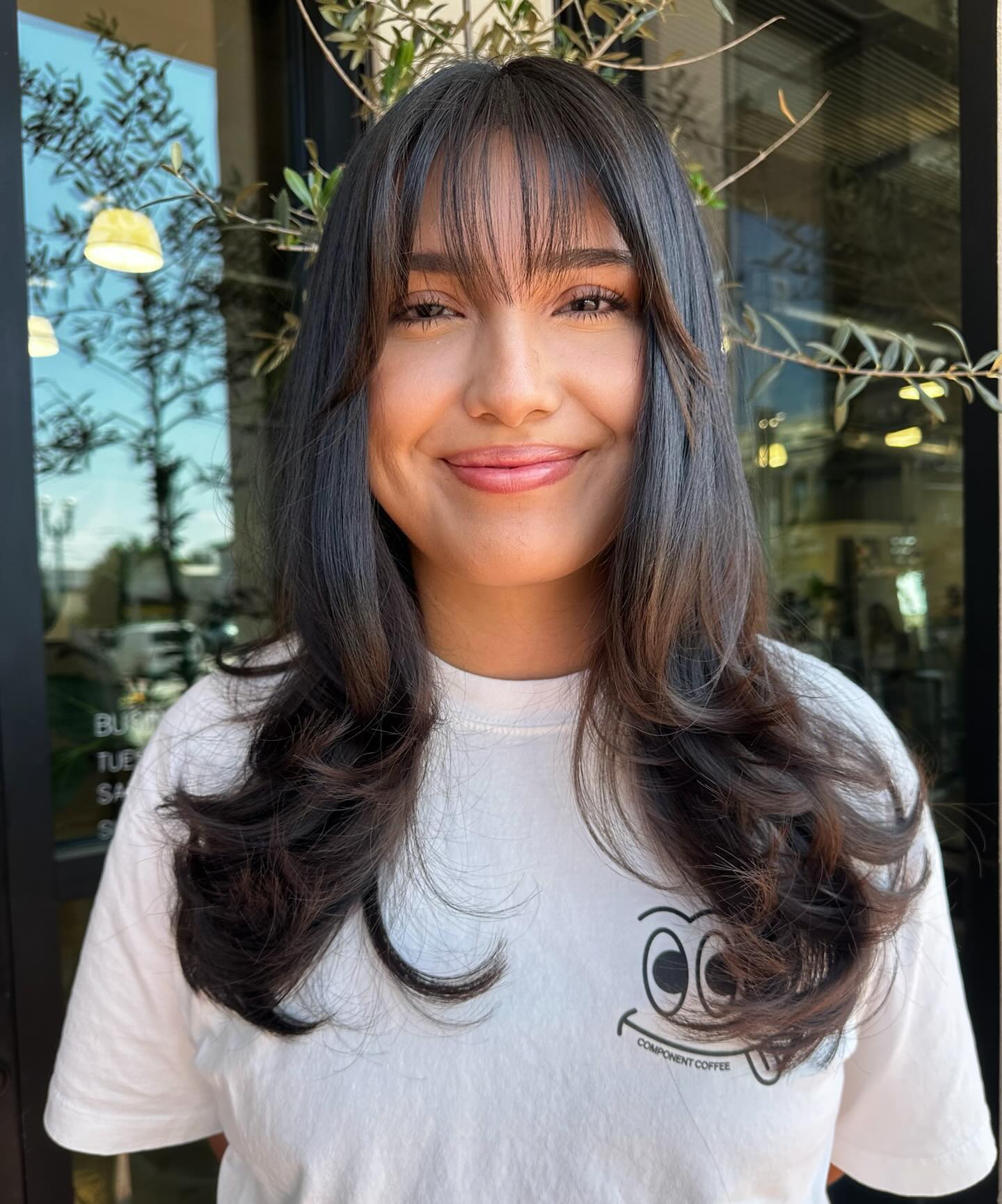 Elegant Long Layers with Soft Blunt Bangs