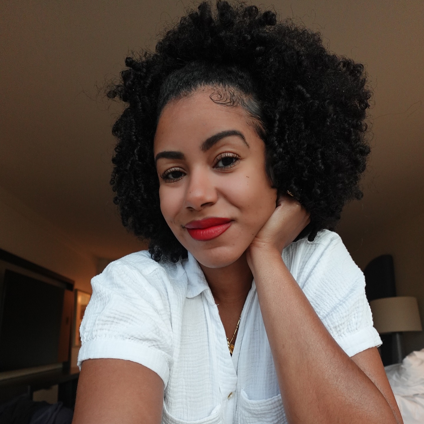 Natural Voluminous Curly Puff with Defined Coils