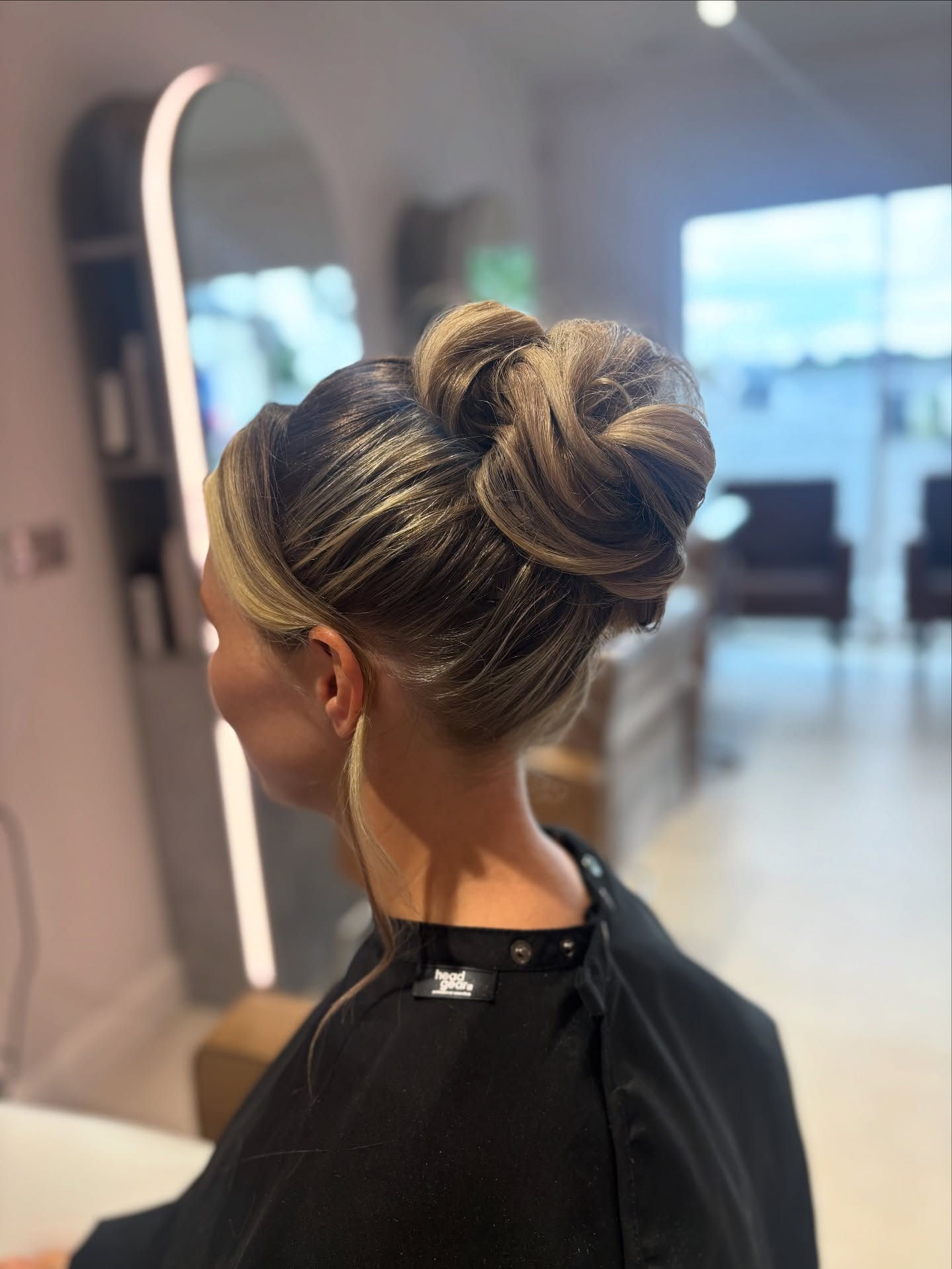 Sculpted Blonde Twist Updo