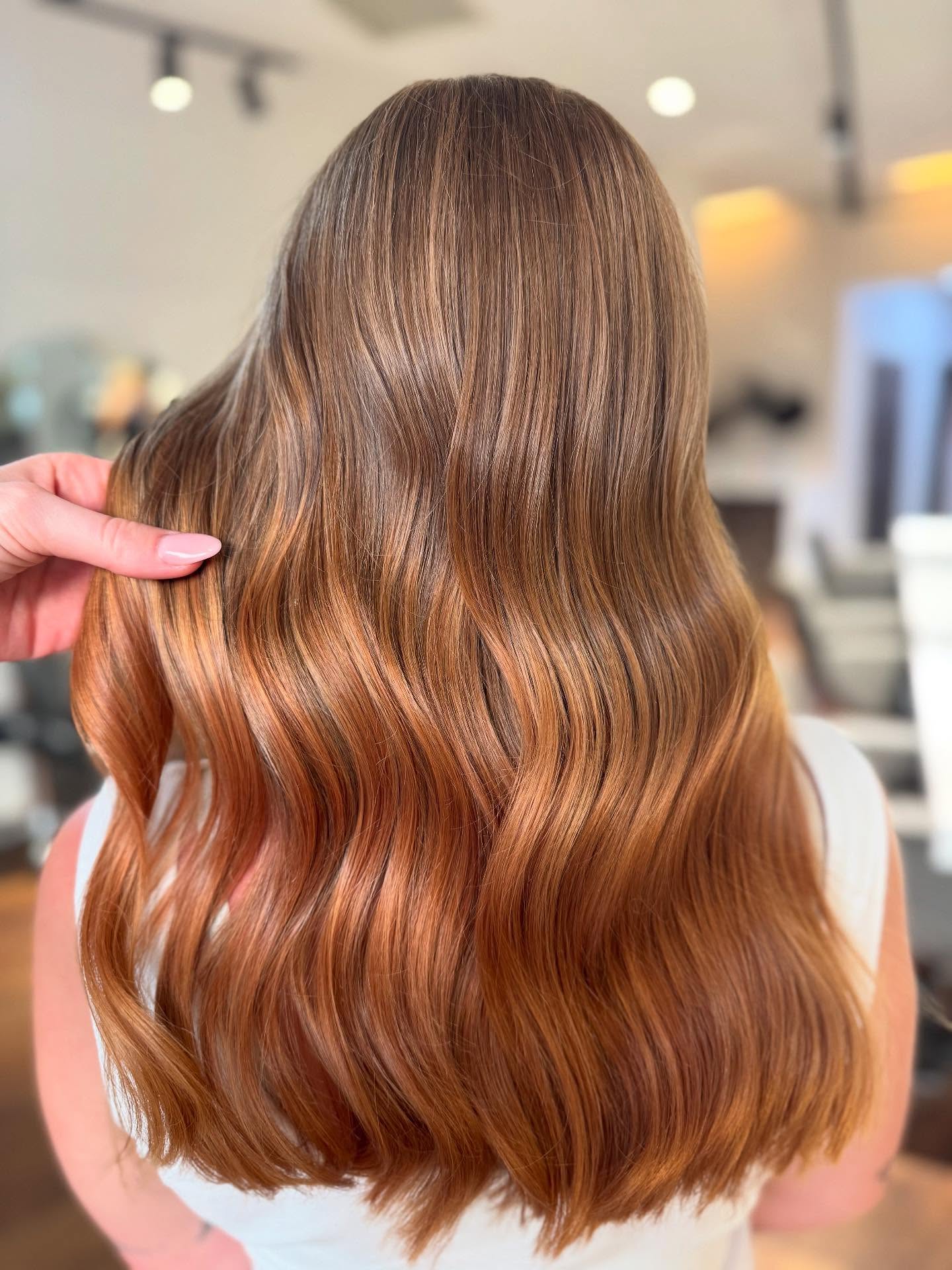 Sleek Amber Waves with Dynamic Copper Highlights
