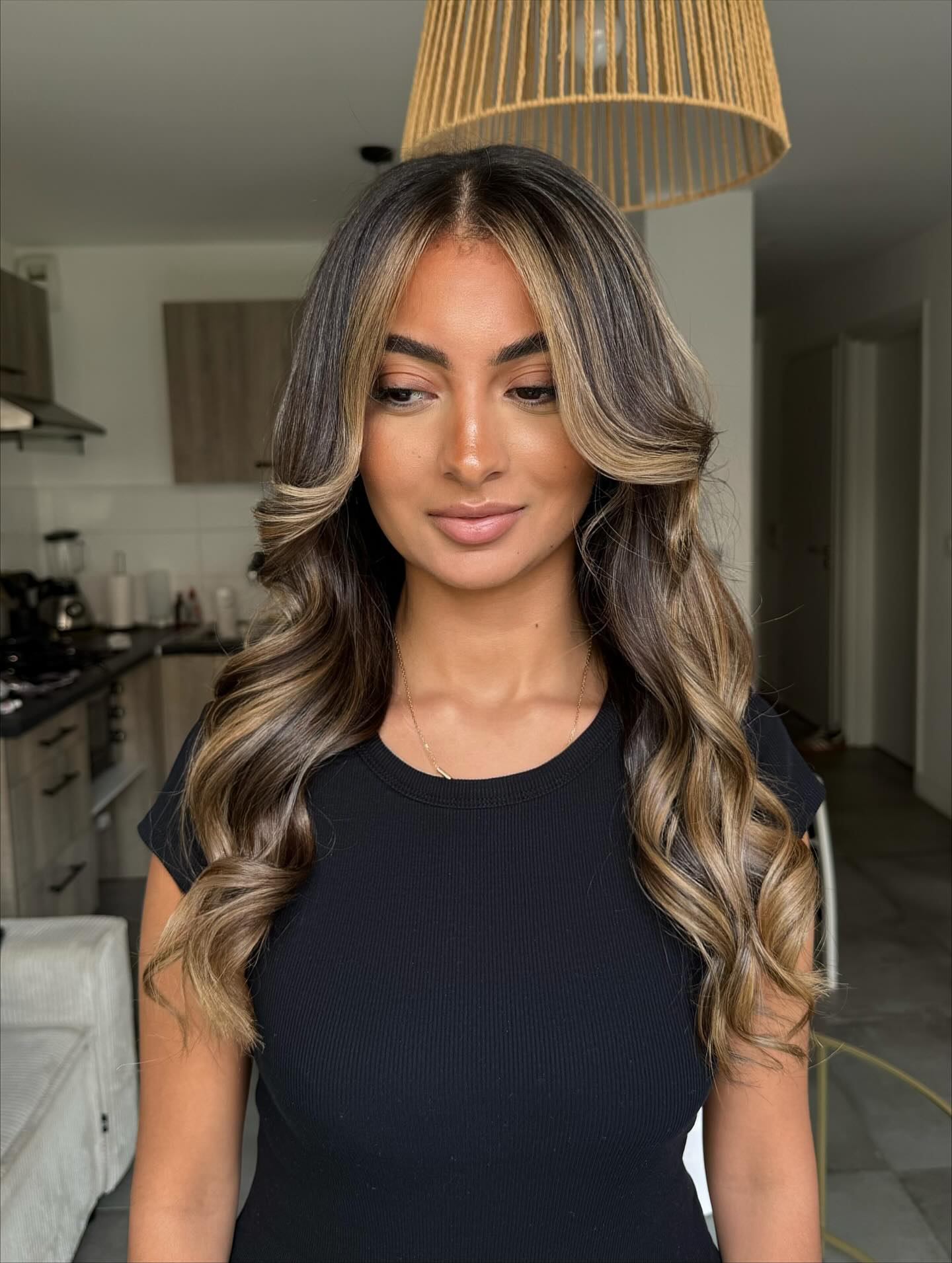 Sleek Caramel Balayage with Soft Waves