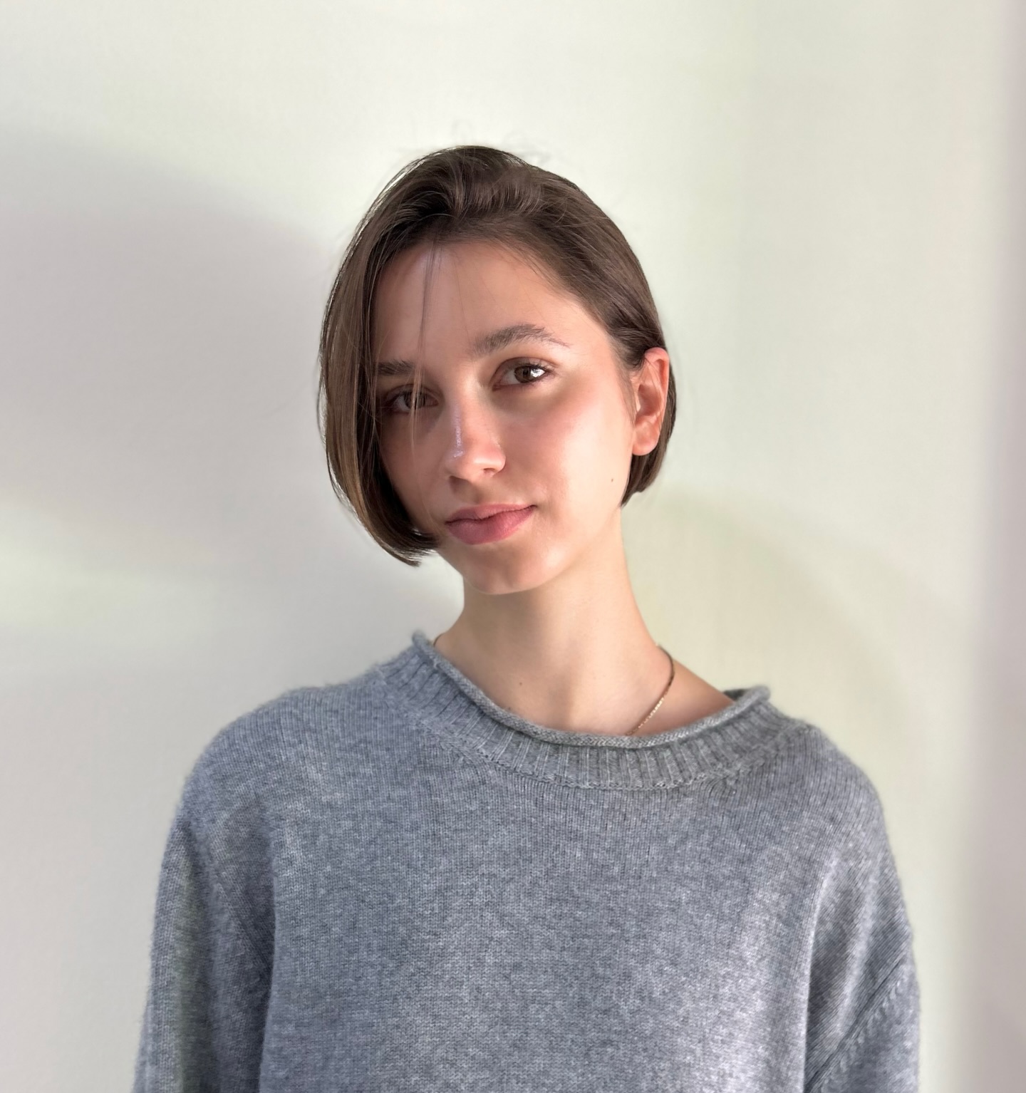 Sleek Chestnut Micro Bob with Side Swept Bangs