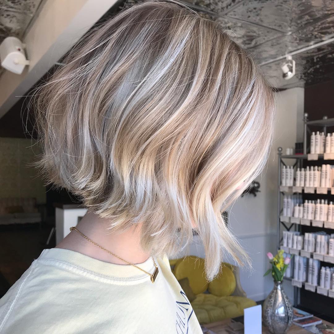 Softly Layered Choppy Bob with Subtle Blonde Highlights