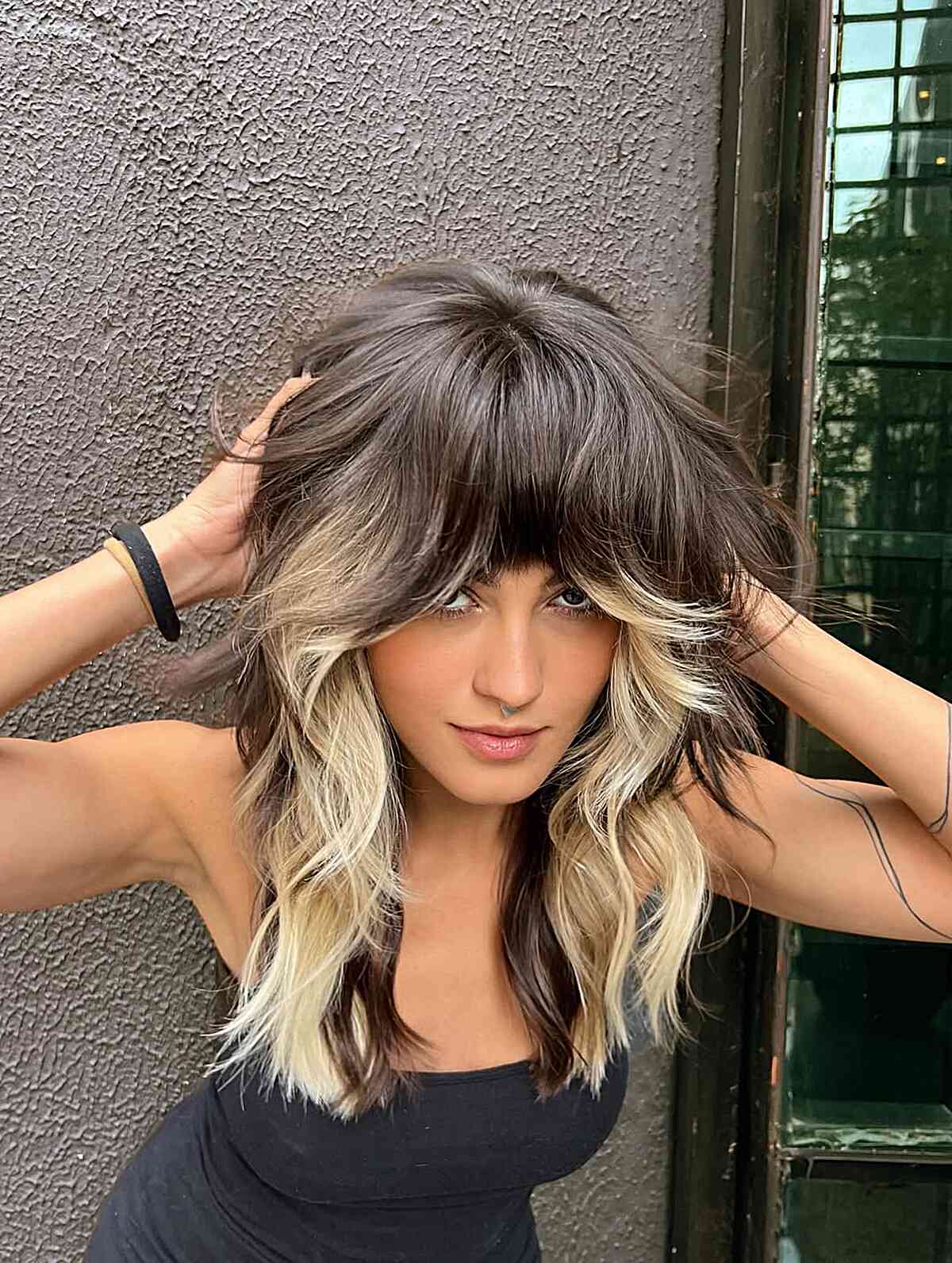 Trendy Shaggy Cut with Bold Blonde Highlights