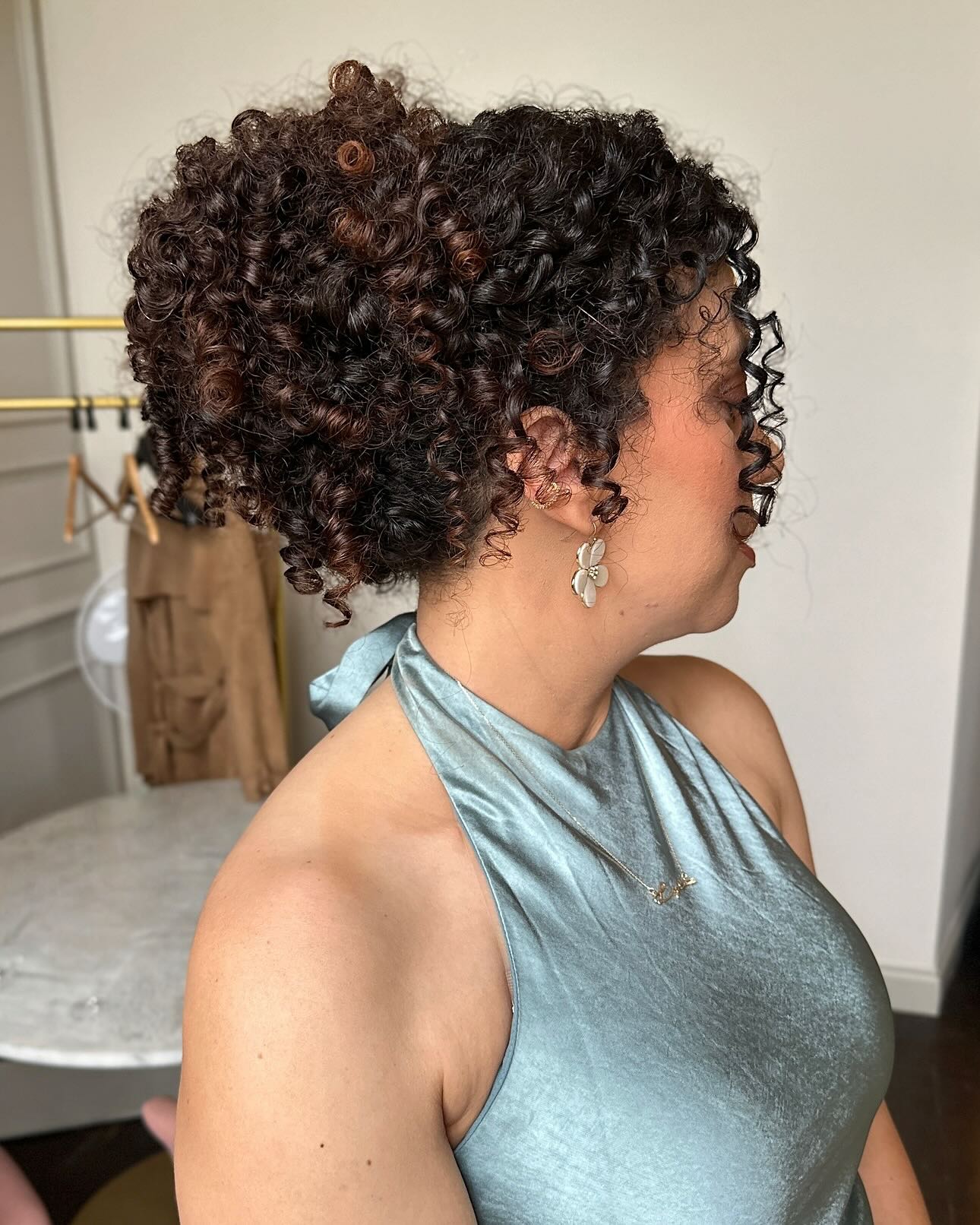 Cascading Chestnut Curly Updo with Strategic Highlights
