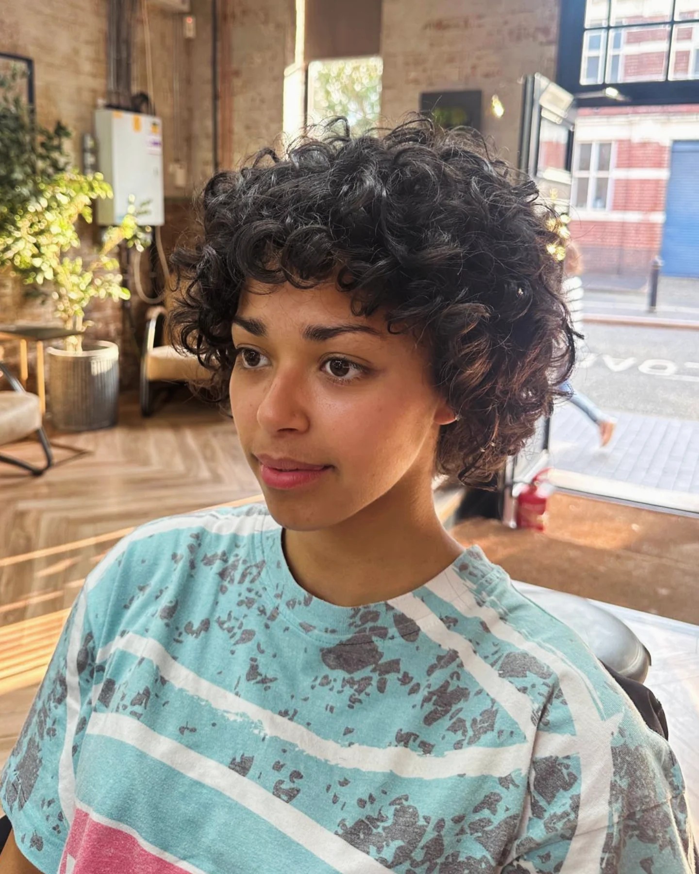 Chic Short Curly Bob with Natural Highlights