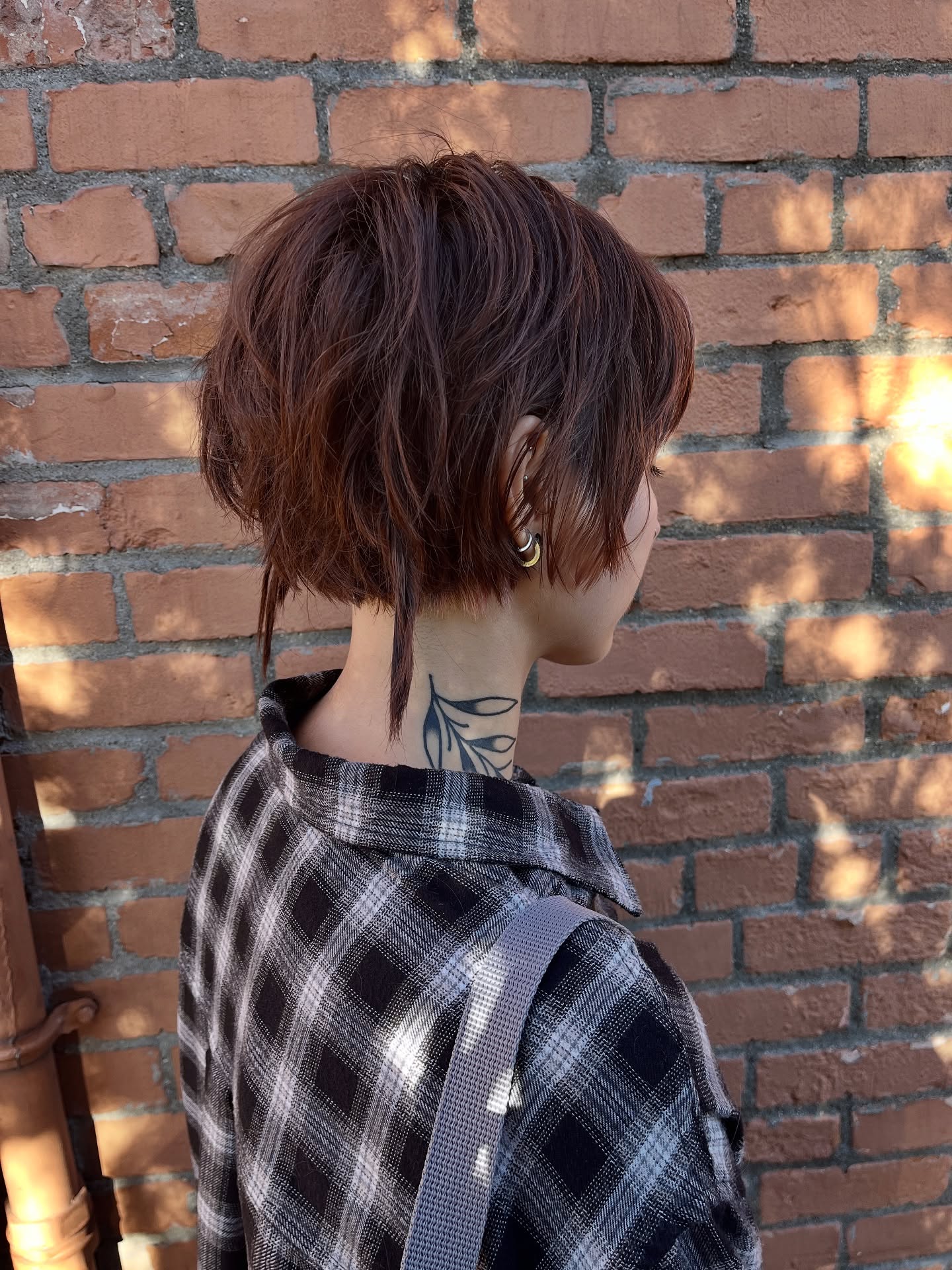 Choppy Auburn Pixie with Subtle Undercut