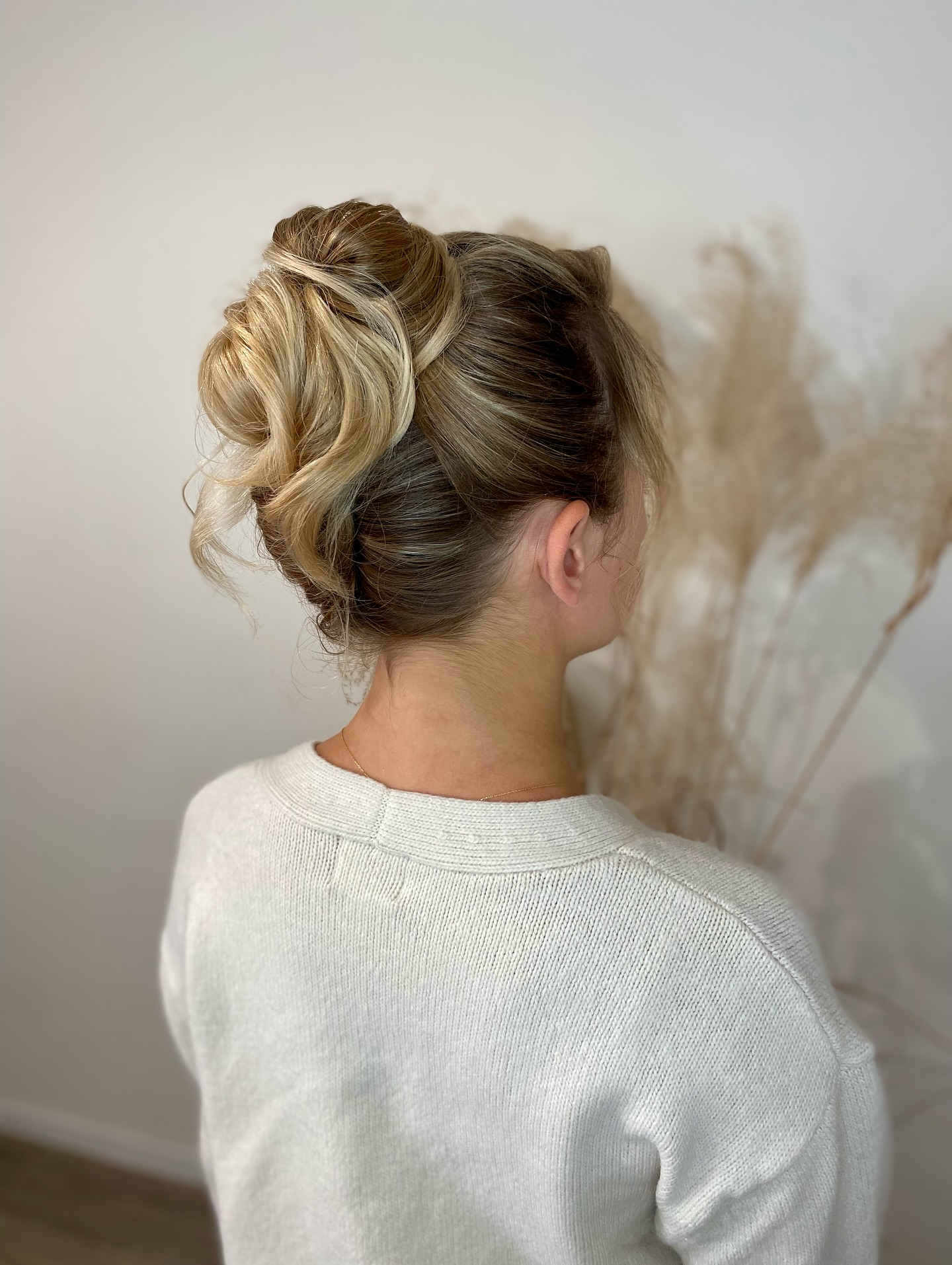Classic Twisted Chignon with Blonde Highlights