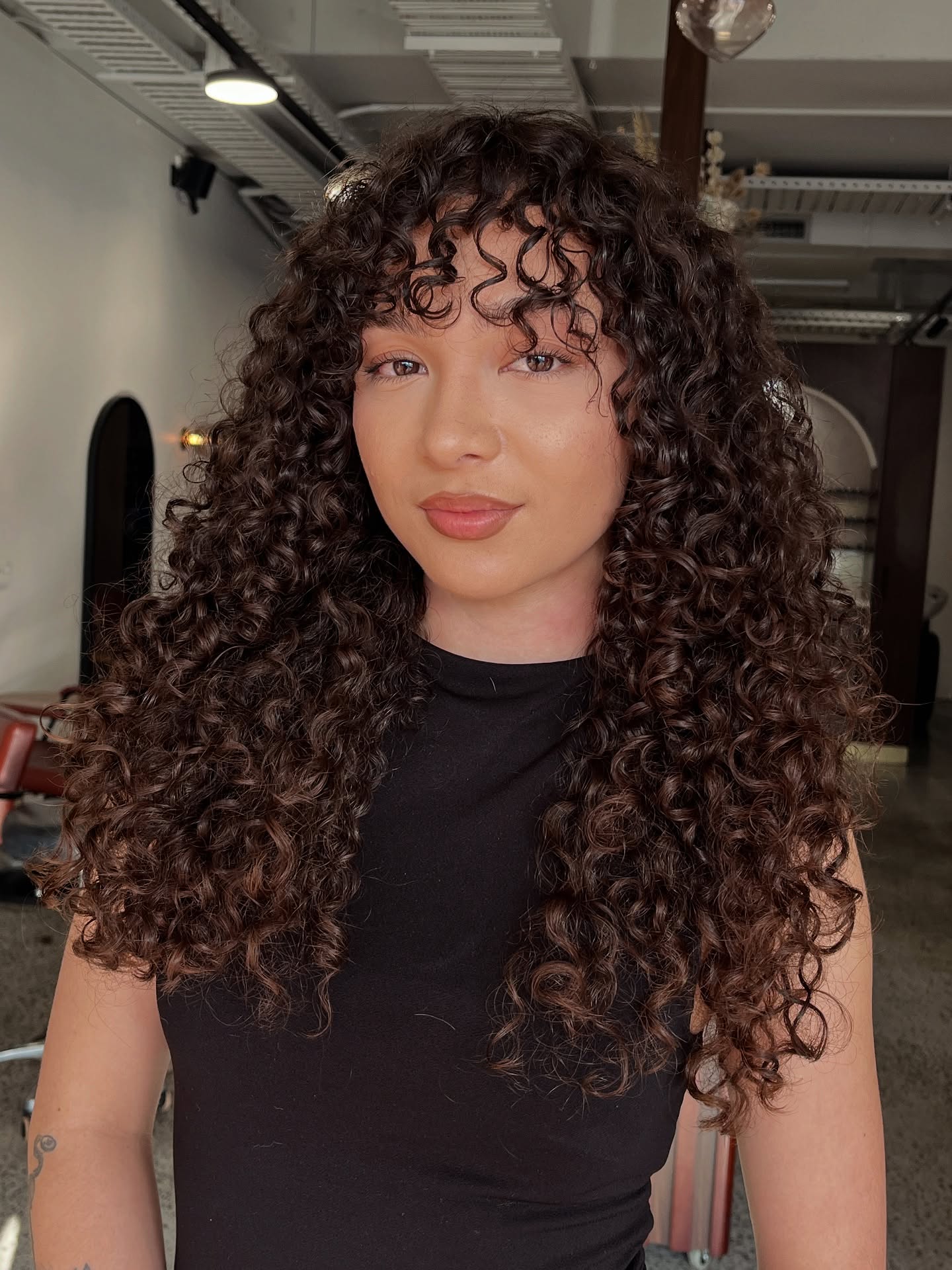 Deep Brown Voluminous Curly Layers