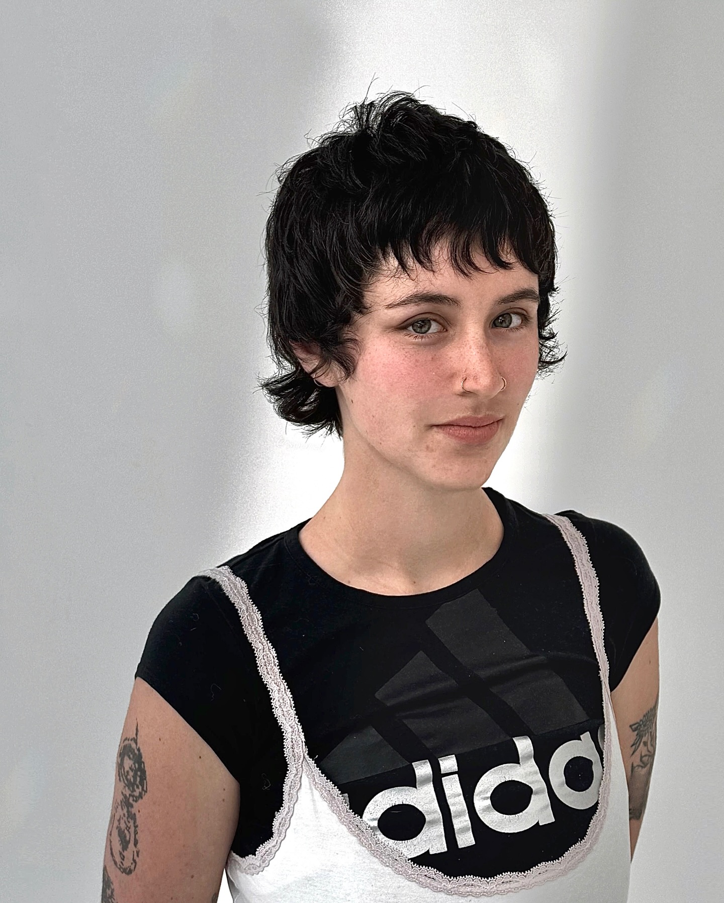 Edgy Tousled Wolfcut with Curled Bangs