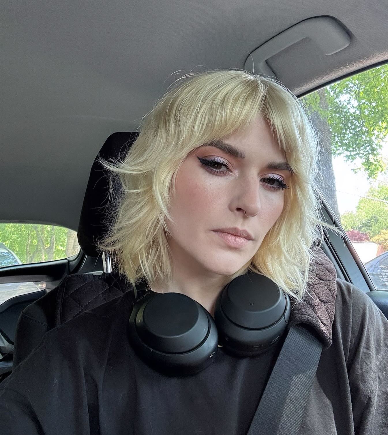 Effortlessly Chic Razored Wolfcut with Voluminous Bangs