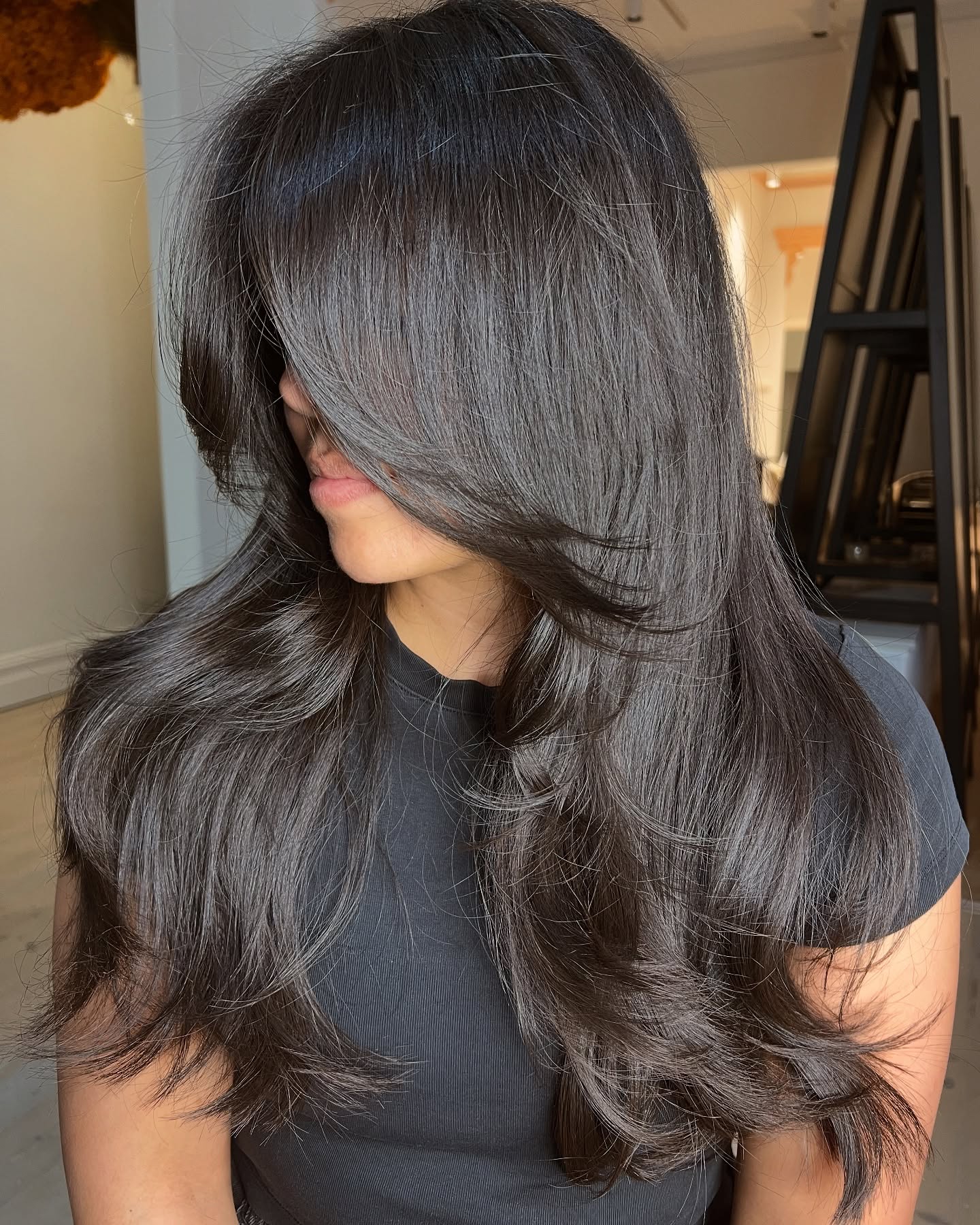 Elegant Long Layers with Subtle Side-Swept Bangs