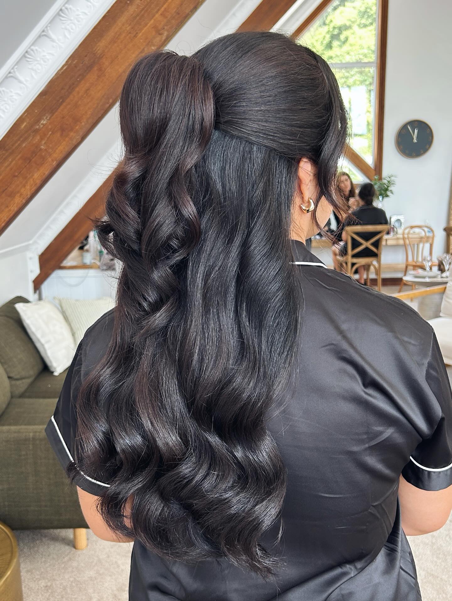 Lustrous Chestnut Waves with Sleek Half-Up Twist