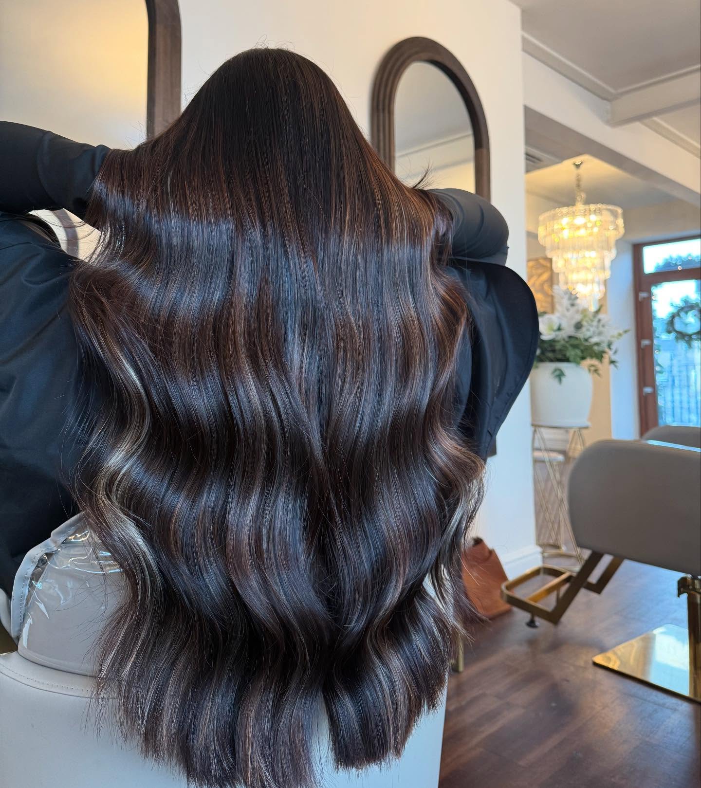 Luxurious Long Black Waves with Subtle Balayage Highlights