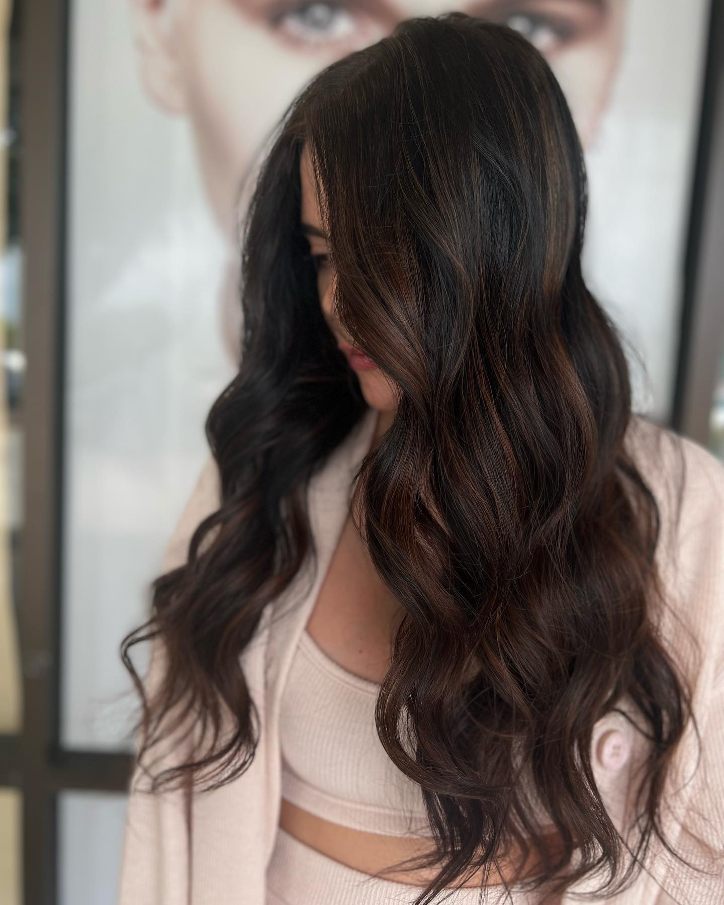Modern Long Black Hair with Subtle Caramel Highlights
