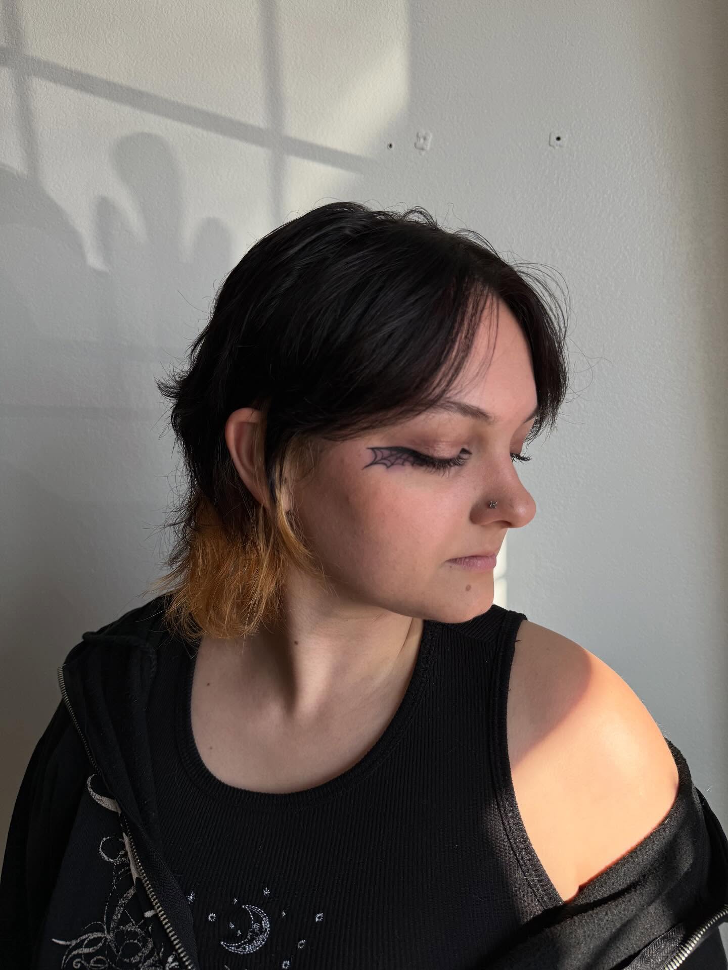 Modish Two-Tone Wolfcut with Side-swept Bangs