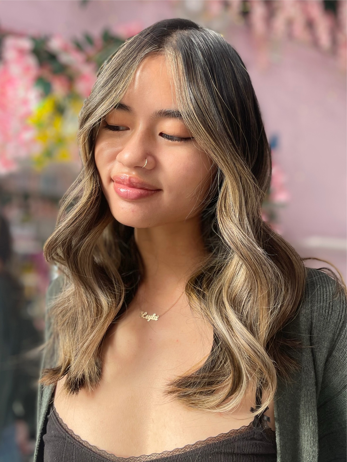 Soft Black Balayage with Subtle Blonde Highlights