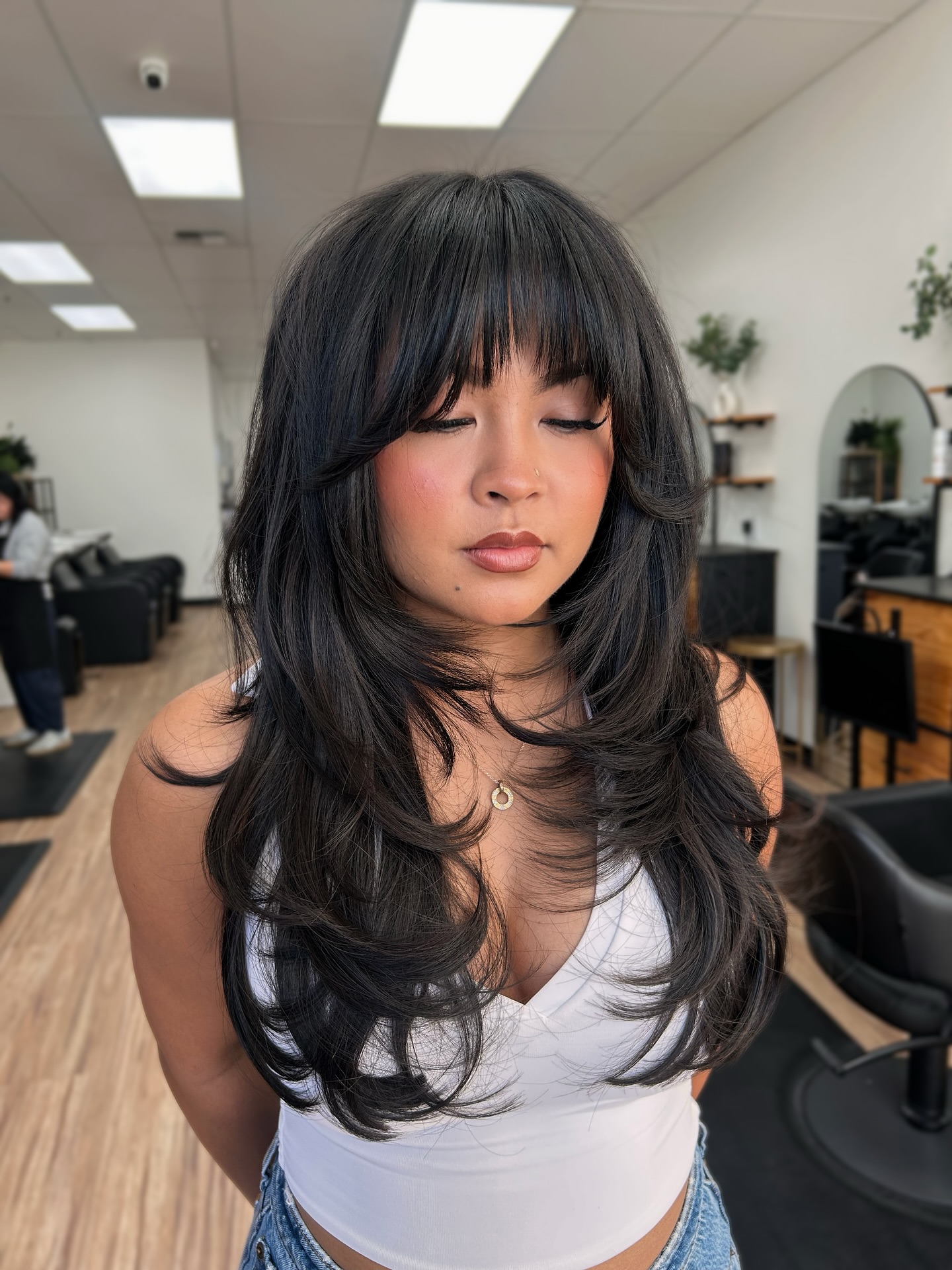 Soft Black Layers with Feathered Bangs