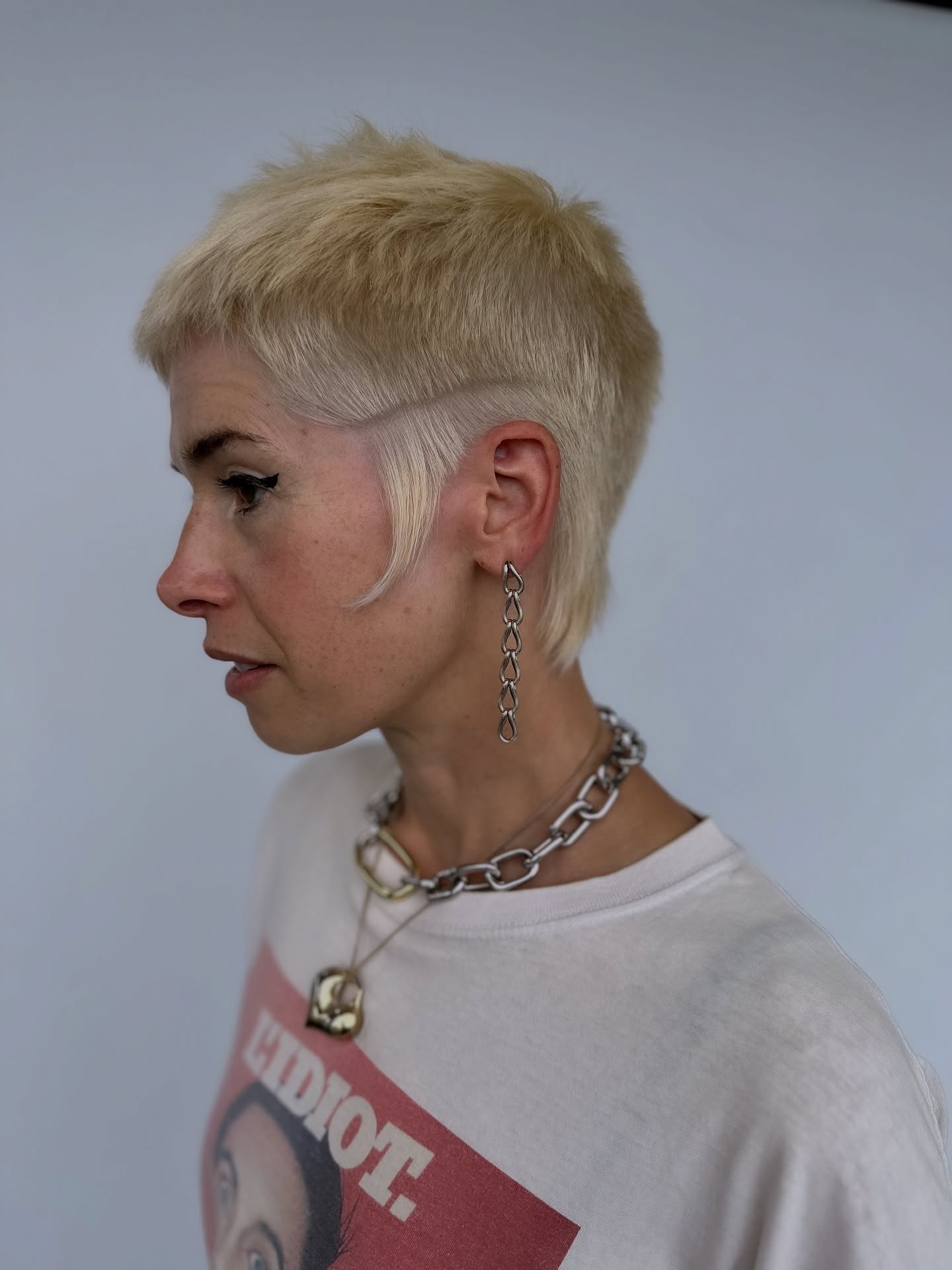 Soft Blonde Undercut with Tapered Nape