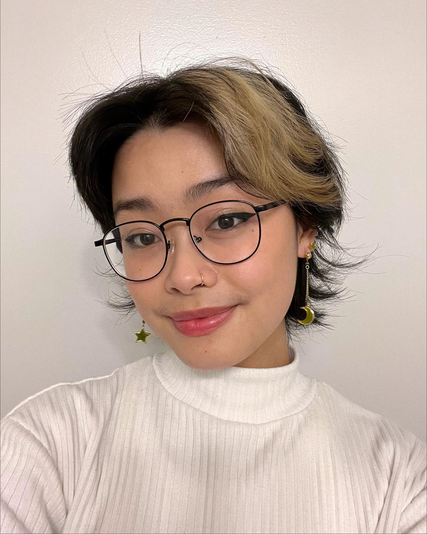 Stylish Asymmetrical Wolfcut with Contrasting Highlights