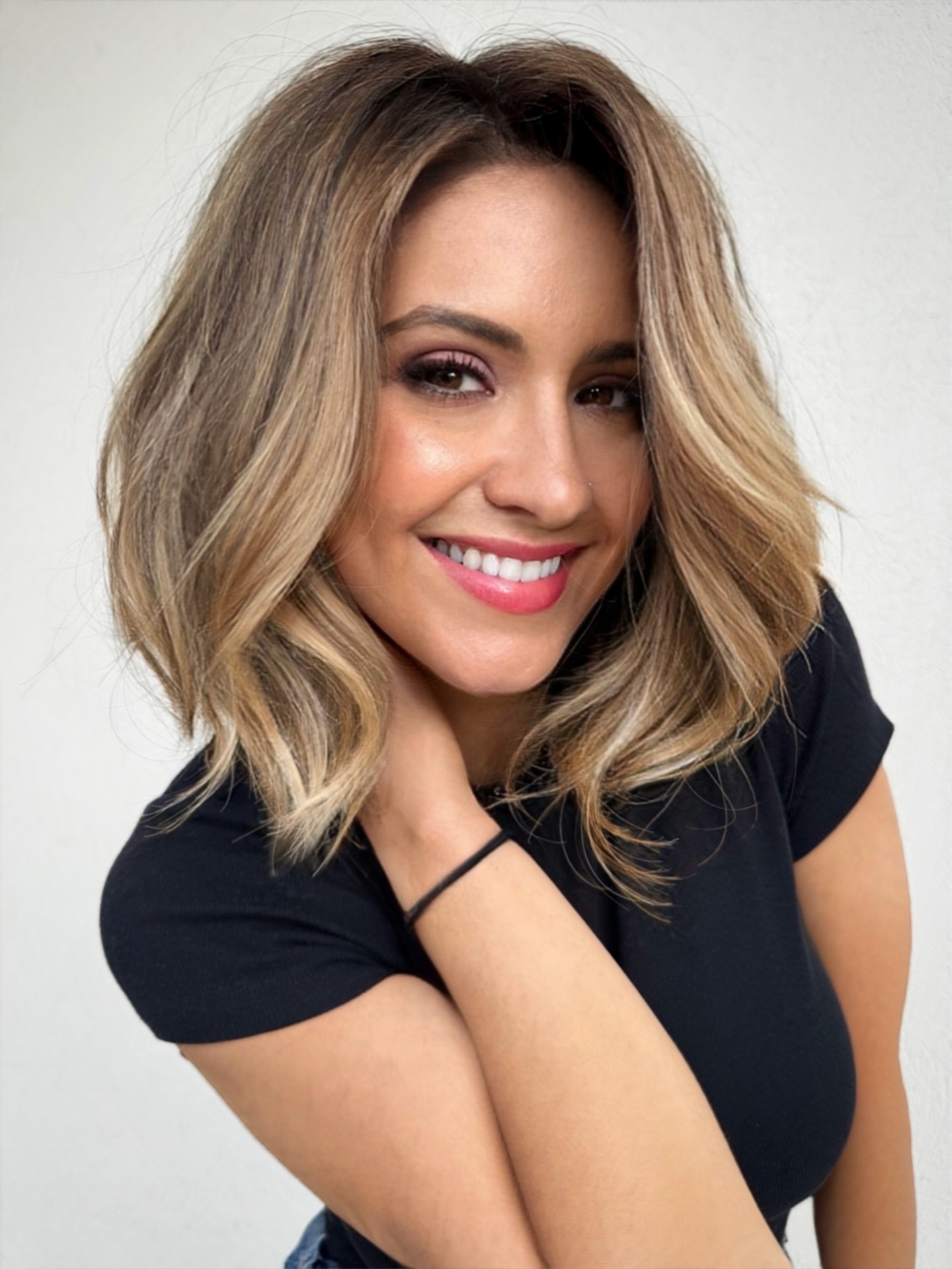 Sun-Kissed Balayage with Soft Layered Waves