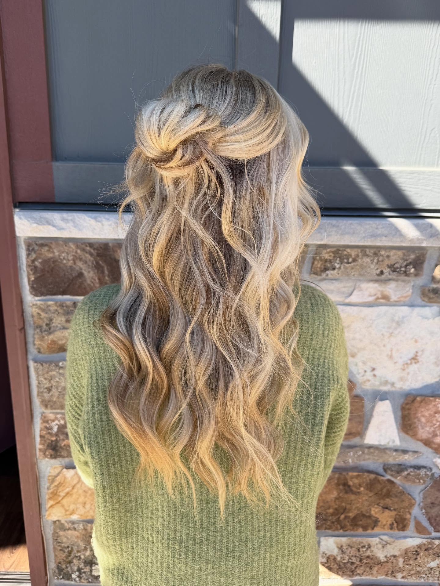 Whimsical Blonde Twist with Gentle Waves