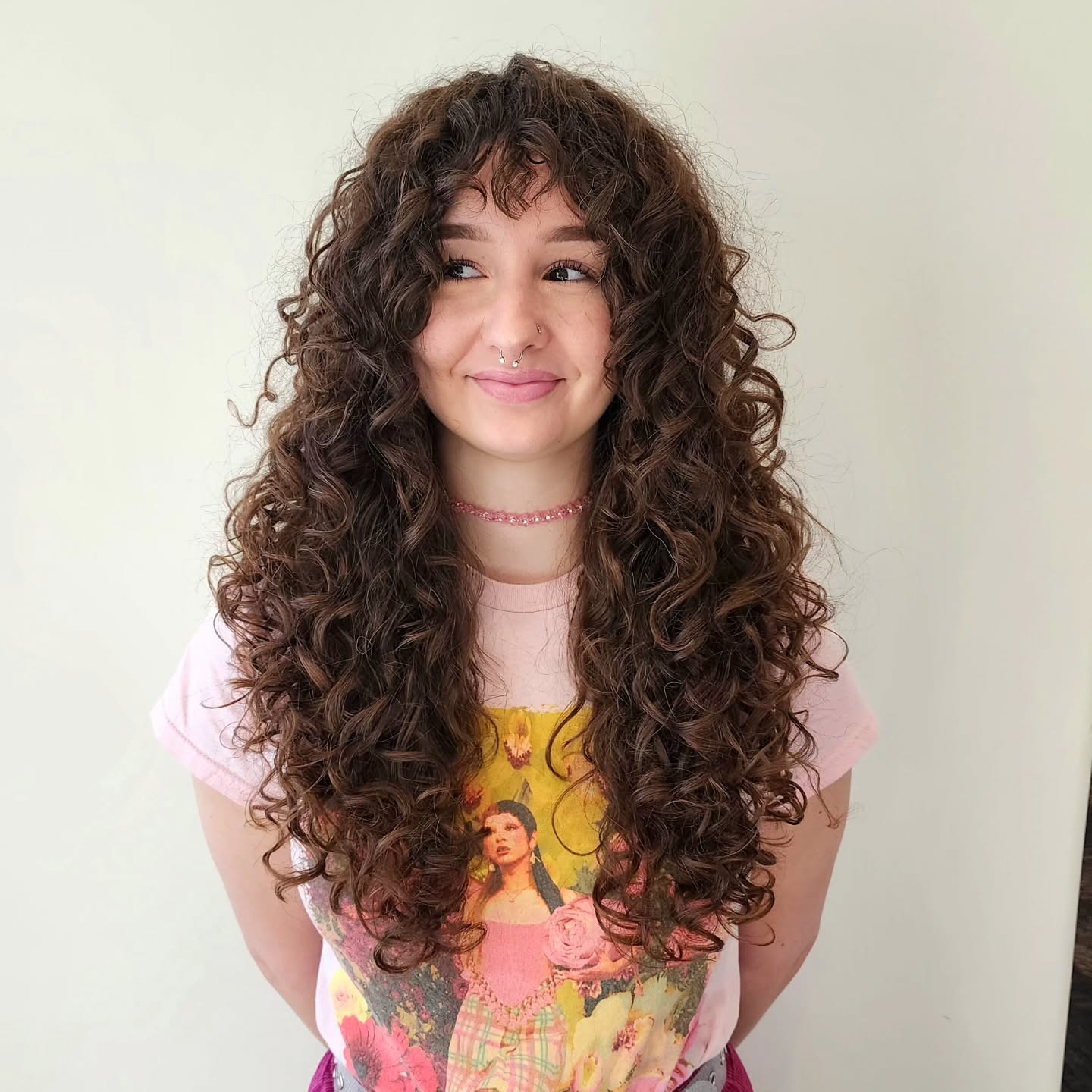 Whimsical Chestnut Curls with Long Cascading Layers