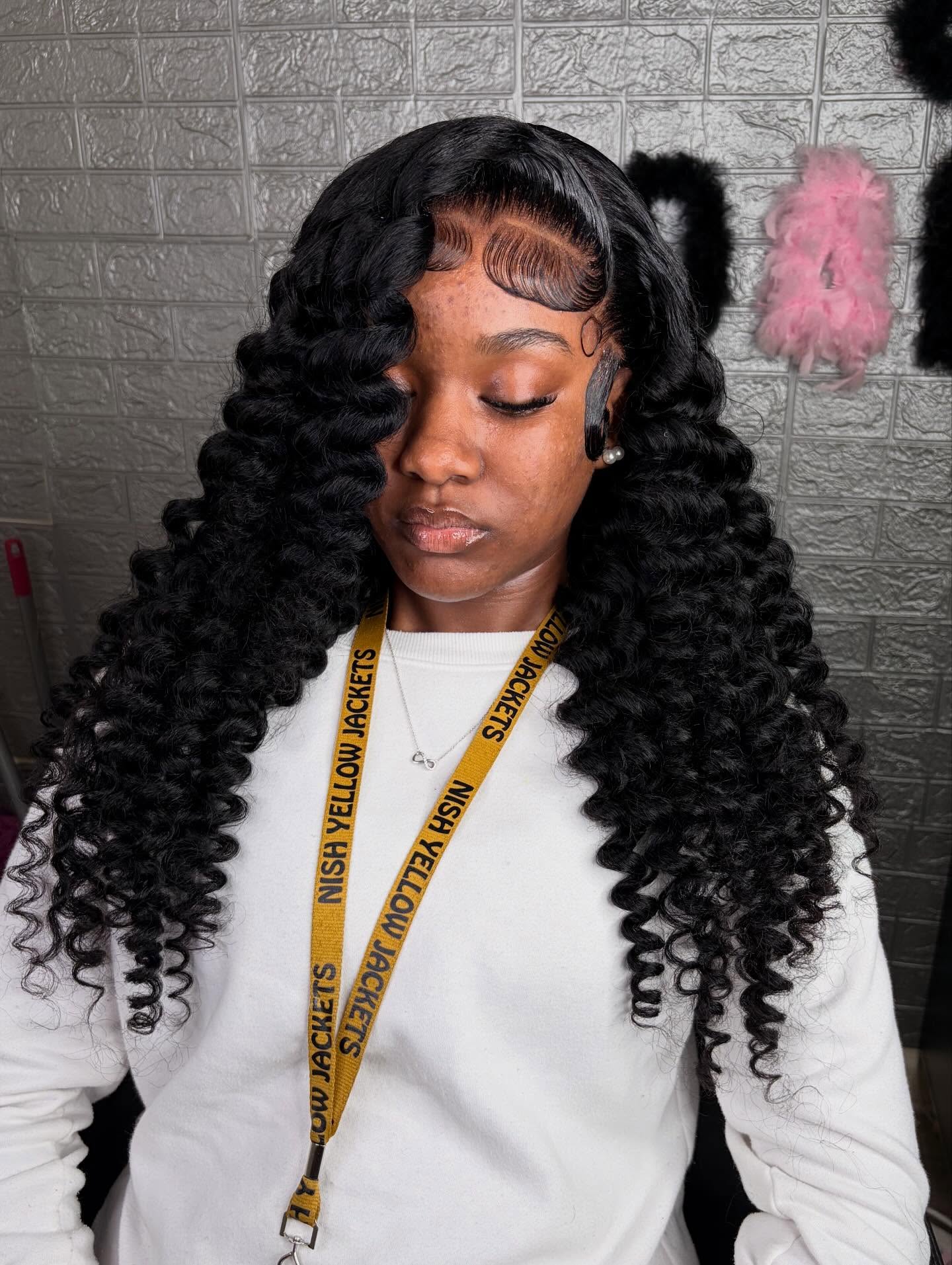 Cascading Ebony Waves with Swooped Bangs