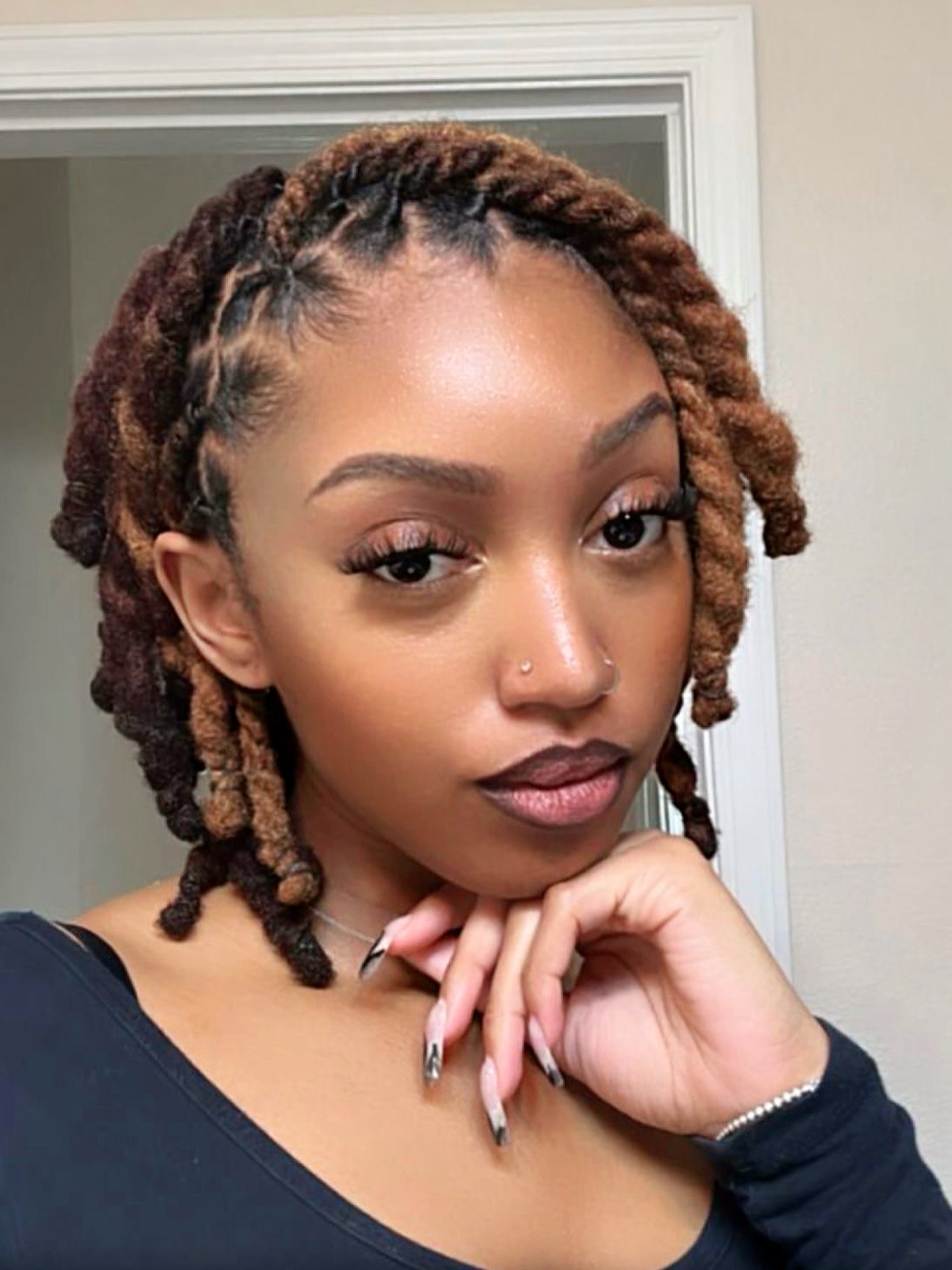 Chic Side-Parted Dreadlocks with Intricate Braiding
