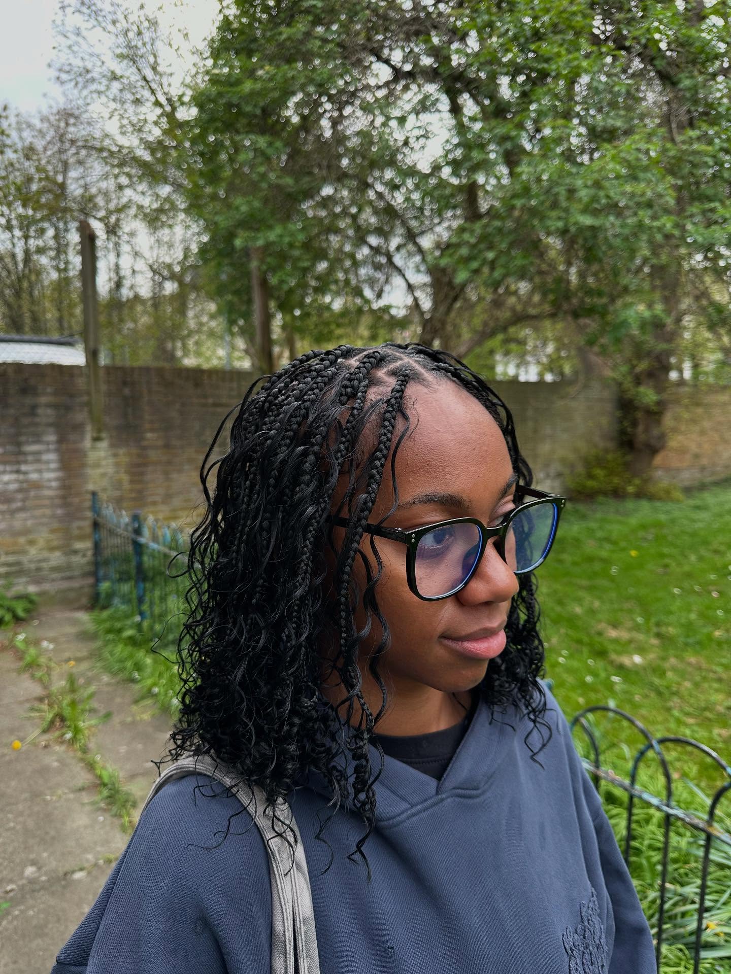 Defined Curls and Braided Edges Hairstyle