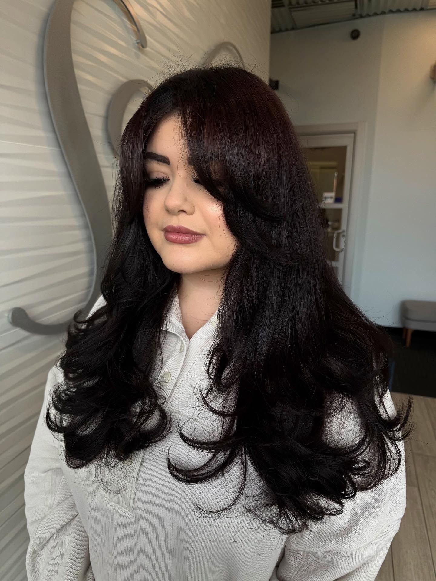Elegant Burgundy Waves with Lush Curtain Bangs