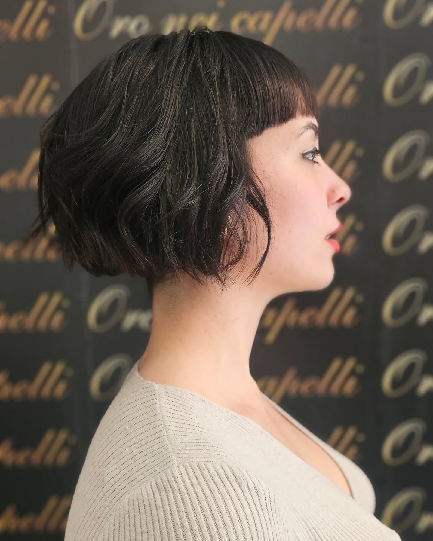 Elegant Dark Tousled Bob with Precision Bangs