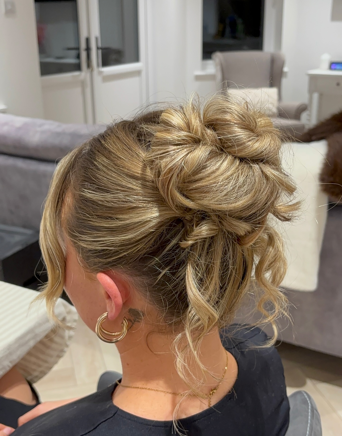Elegant Twisted Updo with Blonde Highlights