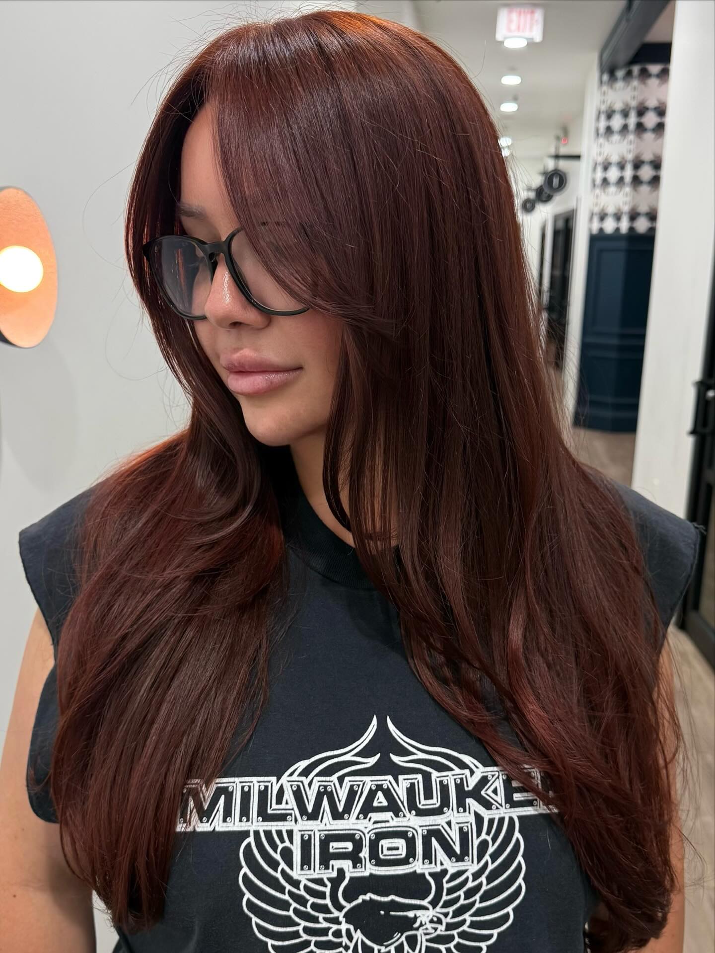 Glossy Auburn Layers with Feathered Curtain Bangs