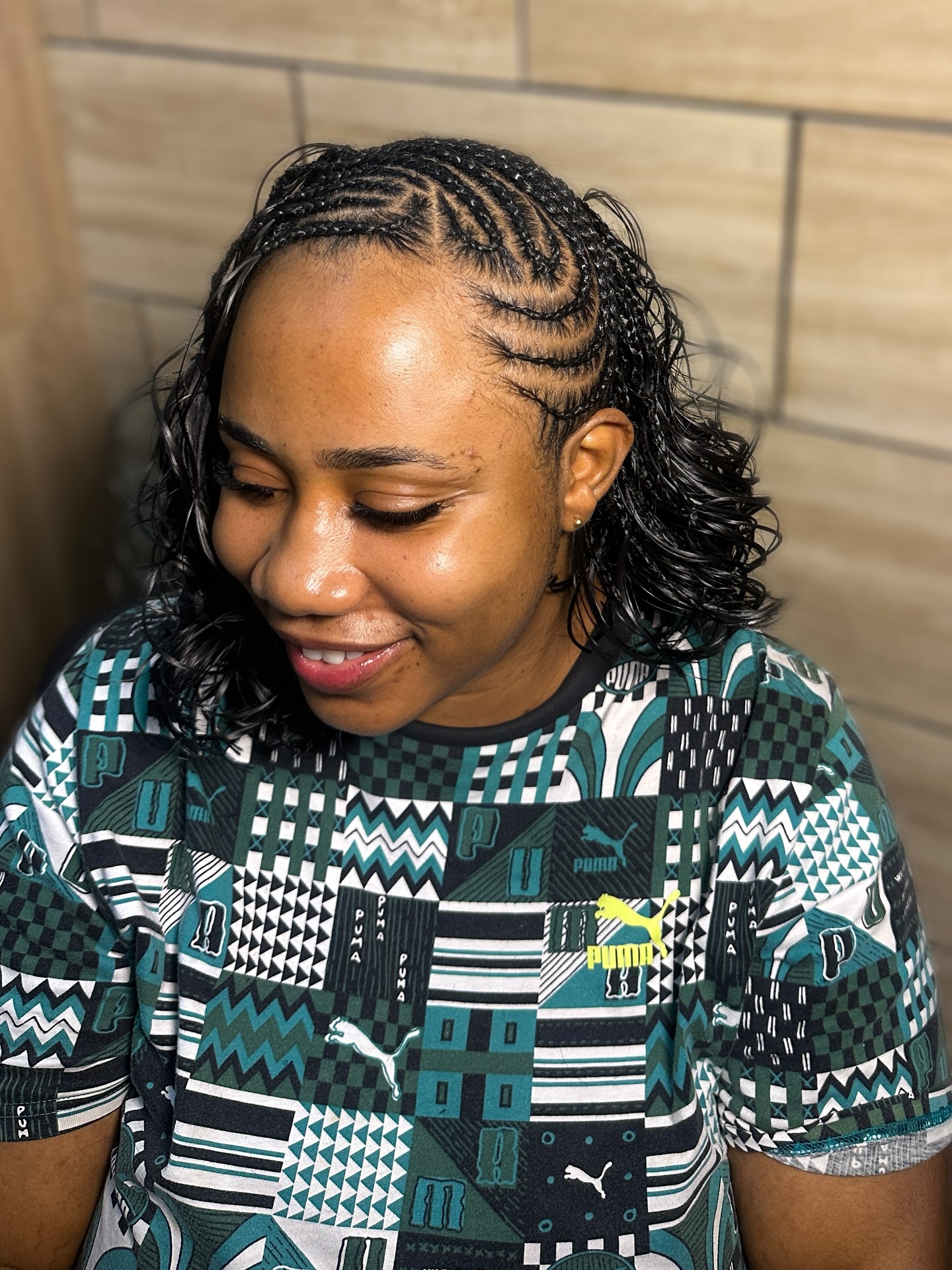 Intricate Cornrow and Wet-Look Waves Combo