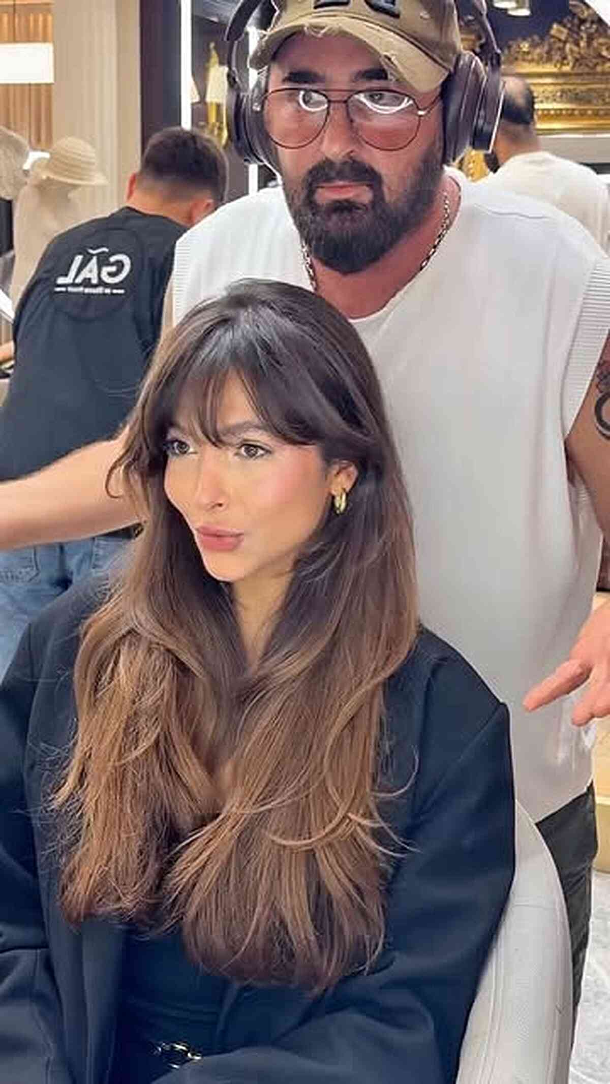 Long Brown Hair with Curtain Bangs and Layers