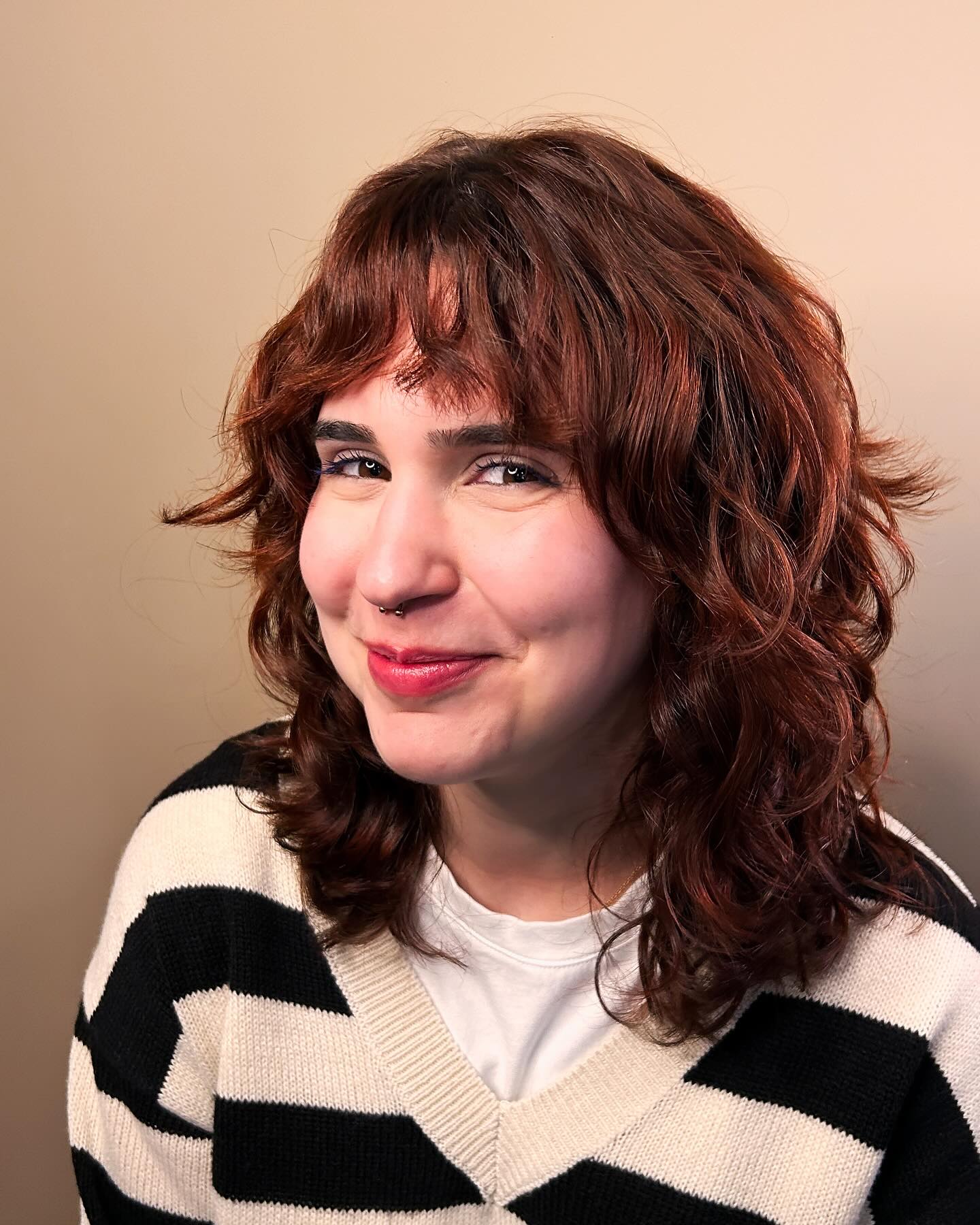 Playful Shaggy Wolf Cut with Defined Curls