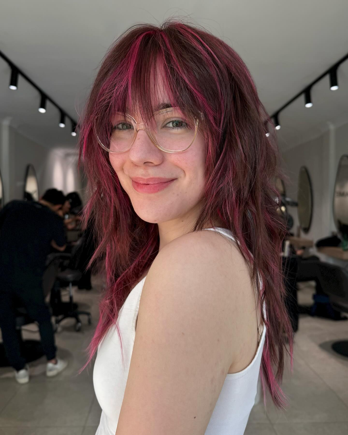 Playful Shaggy Wolf Cut with Vibrant Highlights