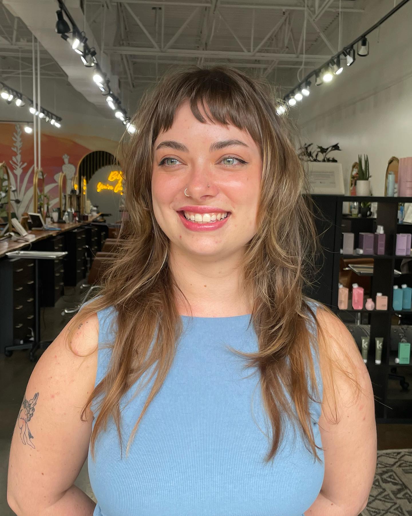 Soft Brunette Waves with Feathered Micro Bangs