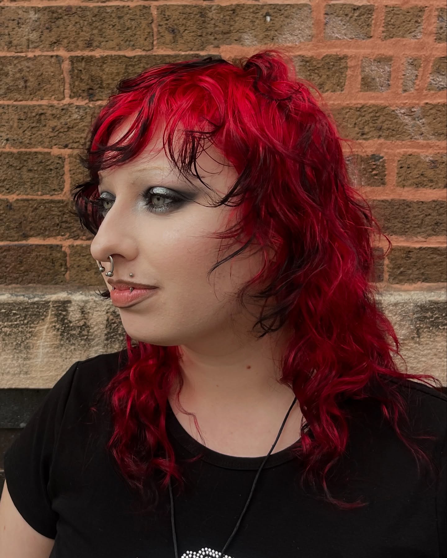 Vibrant Red Textured Mullet with Flowing Waves